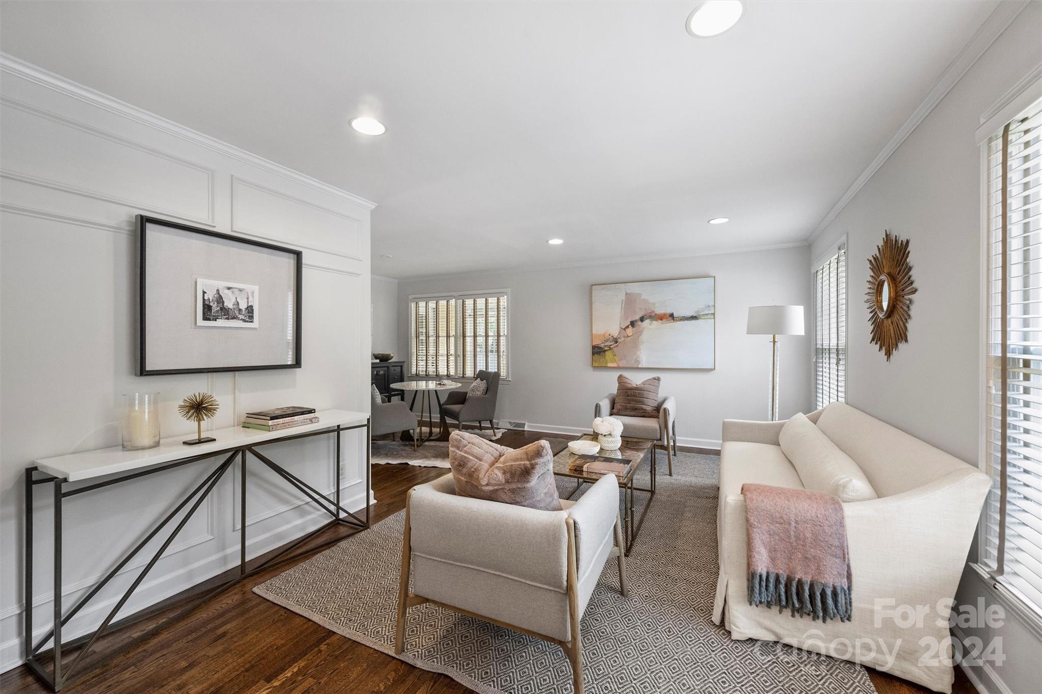 4115 Sulkirk Road Charlotte, NC 28210 - Photo 5 of 39 a living room with furniture windows and a wooden floor