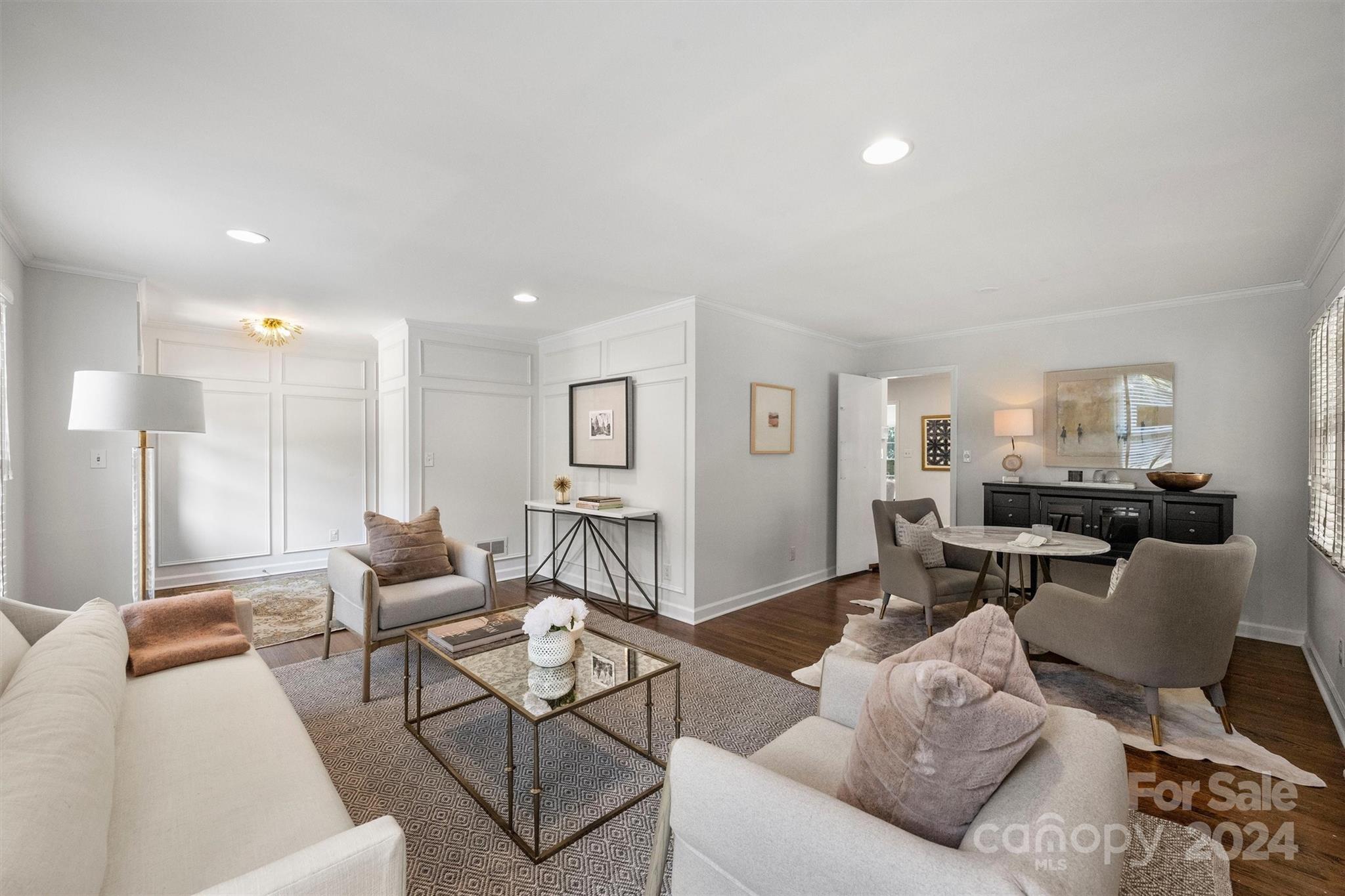 4115 Sulkirk Road Charlotte, NC 28210 - Photo 8 of 39 a living room with furniture and a table