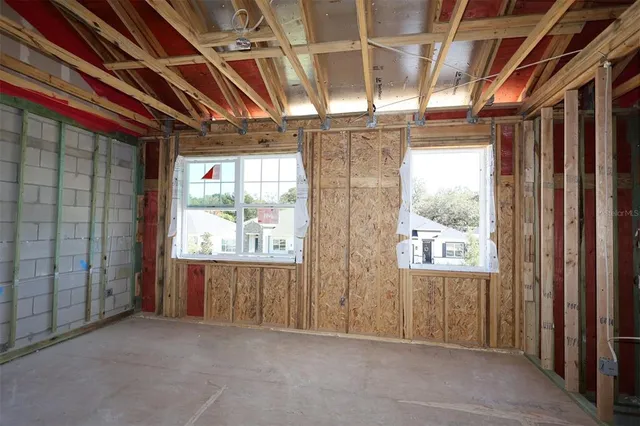 an empty room with windows