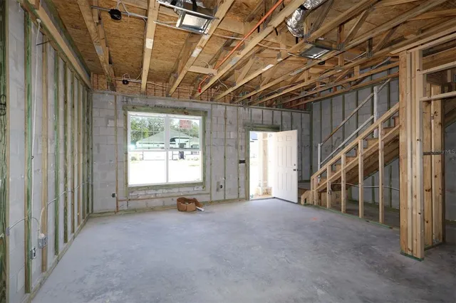 a view of livingroom with furniture and windows
