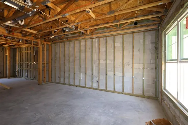 a view of an empty room with a sliding door