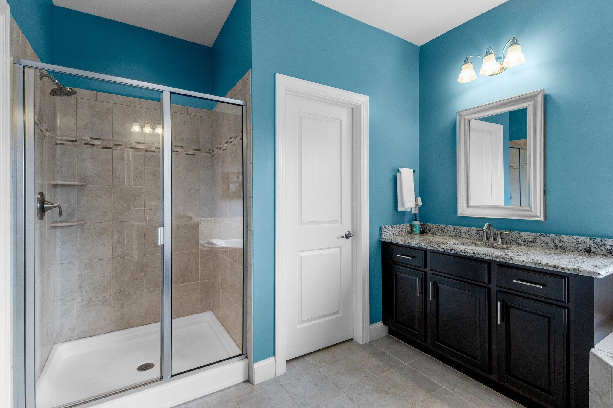 1545 Fullerton Place Raleigh, NC 27607 - Photo 22 of 45 Walk in shower and separate lavatory room with privacy door. Primary Bathroom
