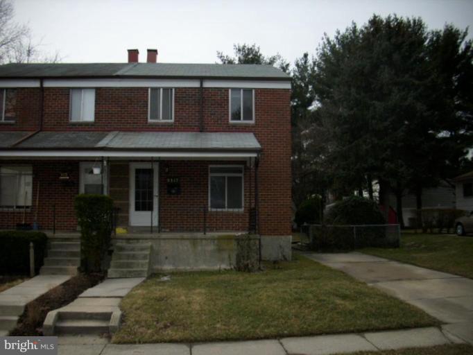 9317 Samoset Road Randallstown, MD 21133 - Photo 1 of 1 a front view of a house with garden