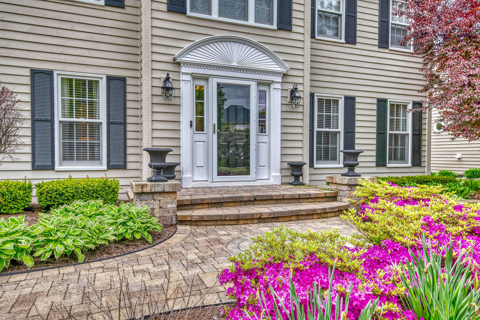 1608 Grommon Road Naperville, IL 60564 - Photo 2 of 48 a front view of a house with entryway
