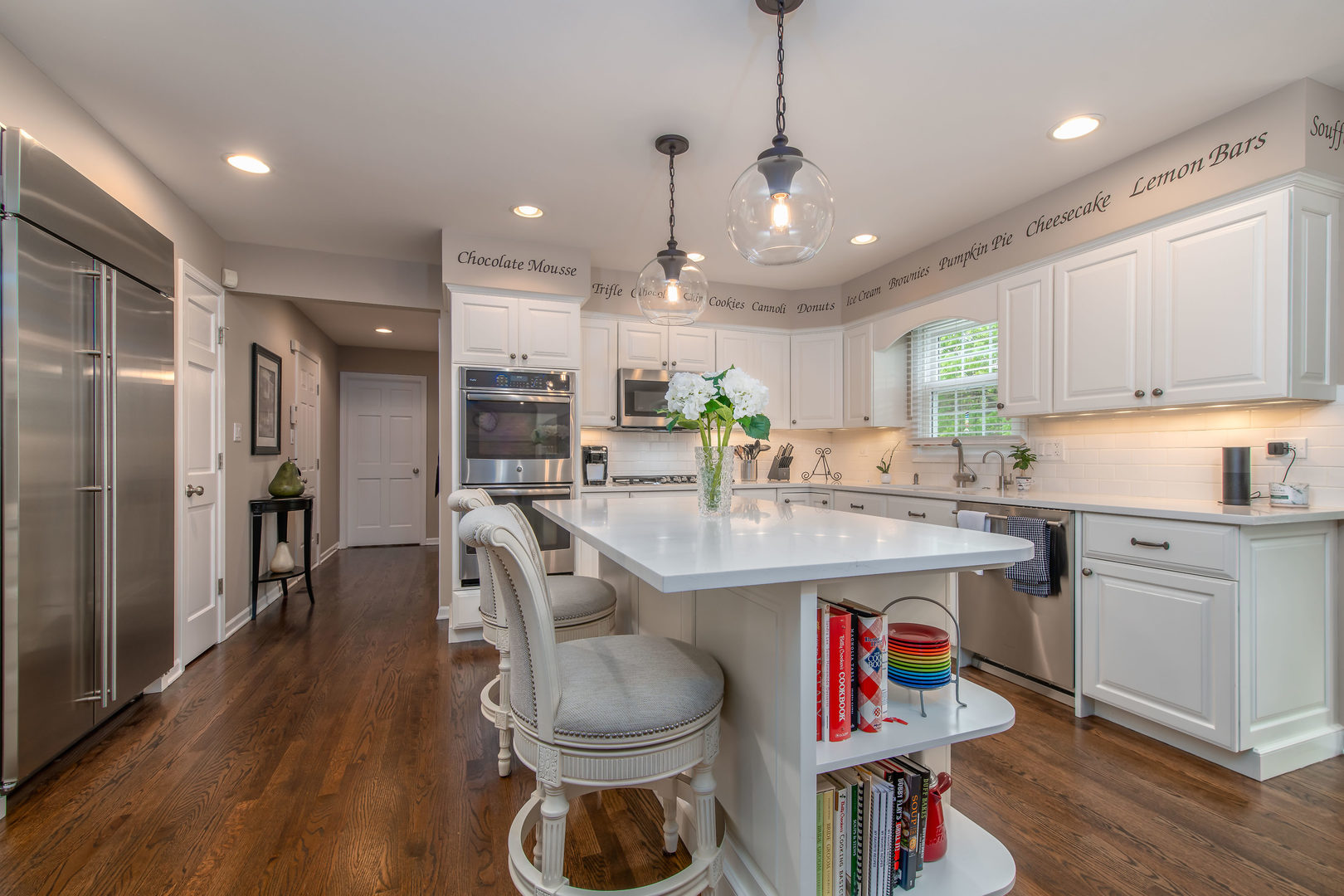 1608 Grommon Road Naperville, IL 60564 - Photo 13 of 48 a kitchen with kitchen island granite countertop a sink a center island stainless steel appliances and cabinets