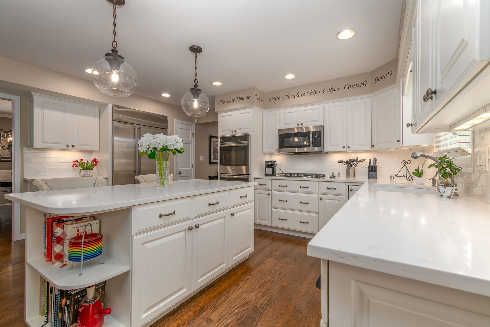 1608 Grommon Road Naperville, IL 60564 - Photo 14 of 48 a kitchen with kitchen island granite countertop a stove a sink and a refrigerator