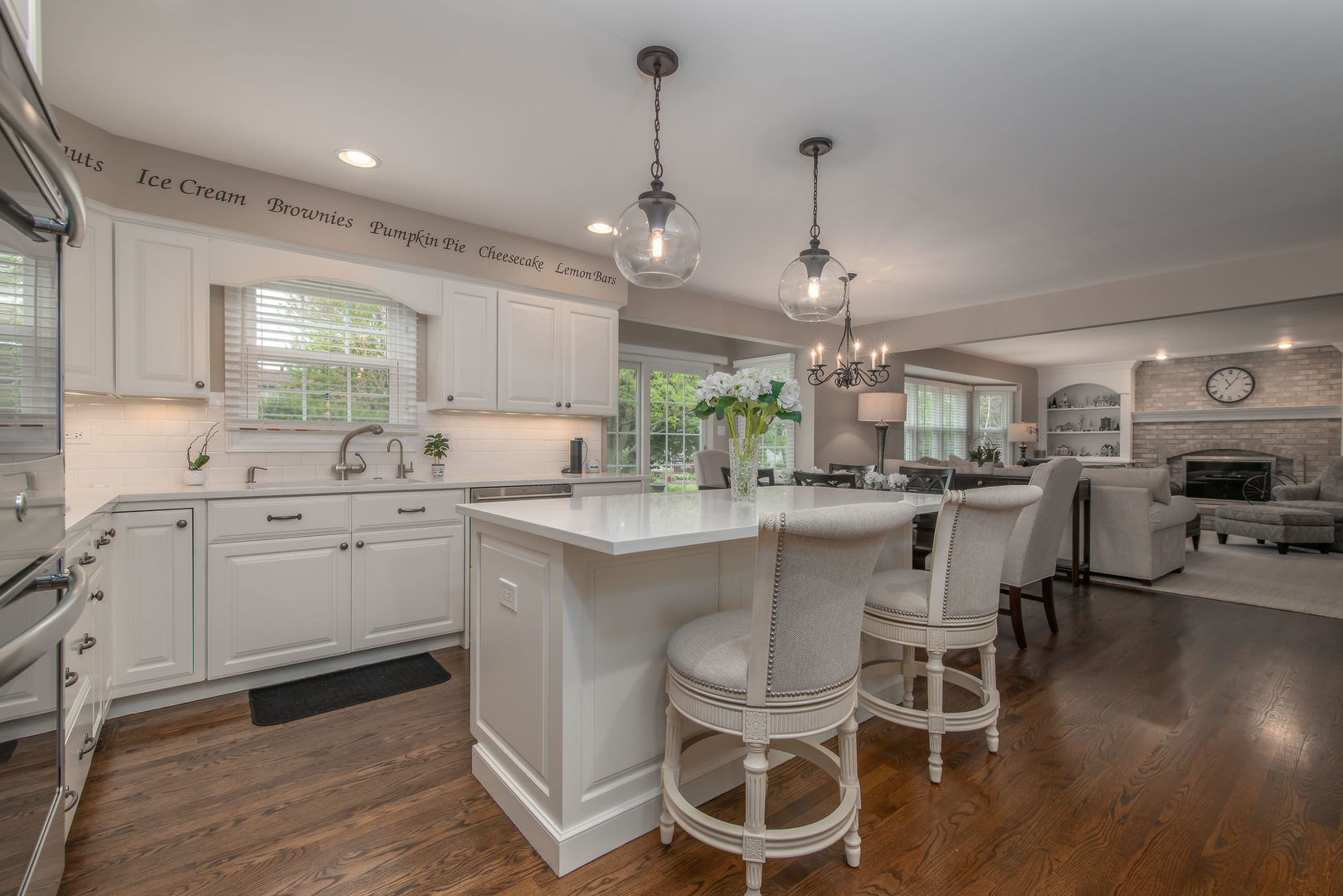1608 Grommon Road Naperville, IL 60564 - Photo 17 of 48 a kitchen with sink cabinets and dining table chairs