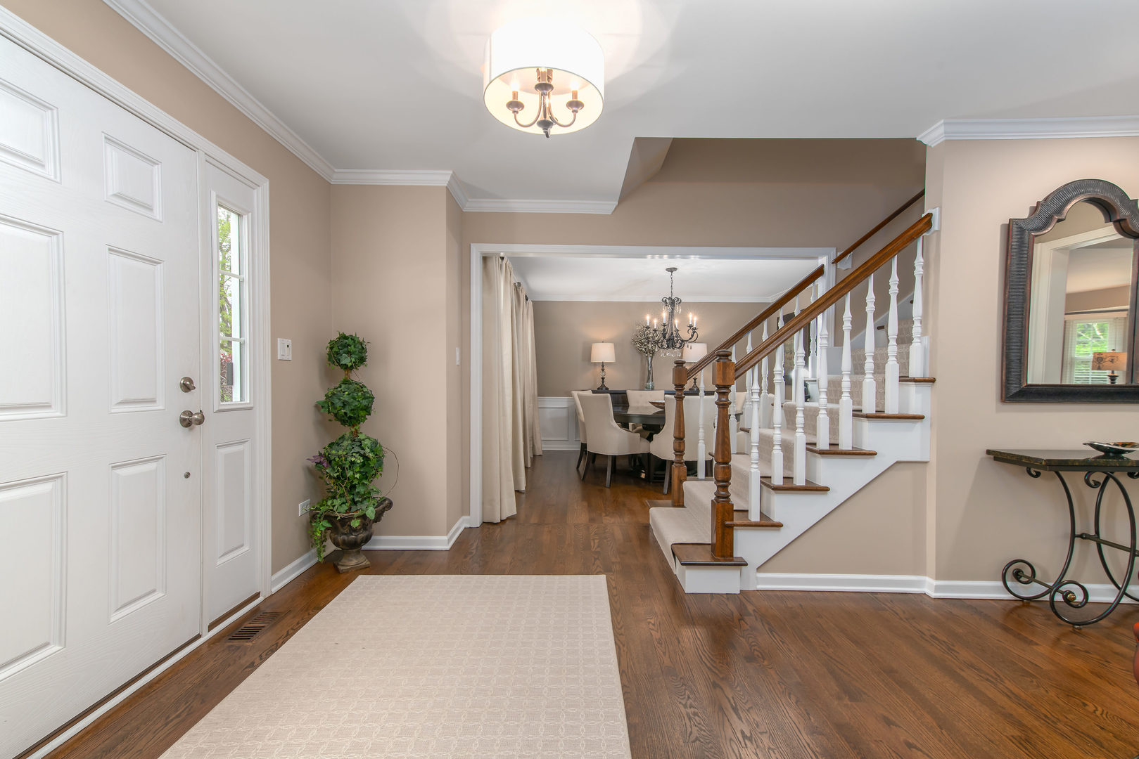 1608 Grommon Road Naperville, IL 60564 - Photo 3 of 48 a view of entryway and hall with wooden floor