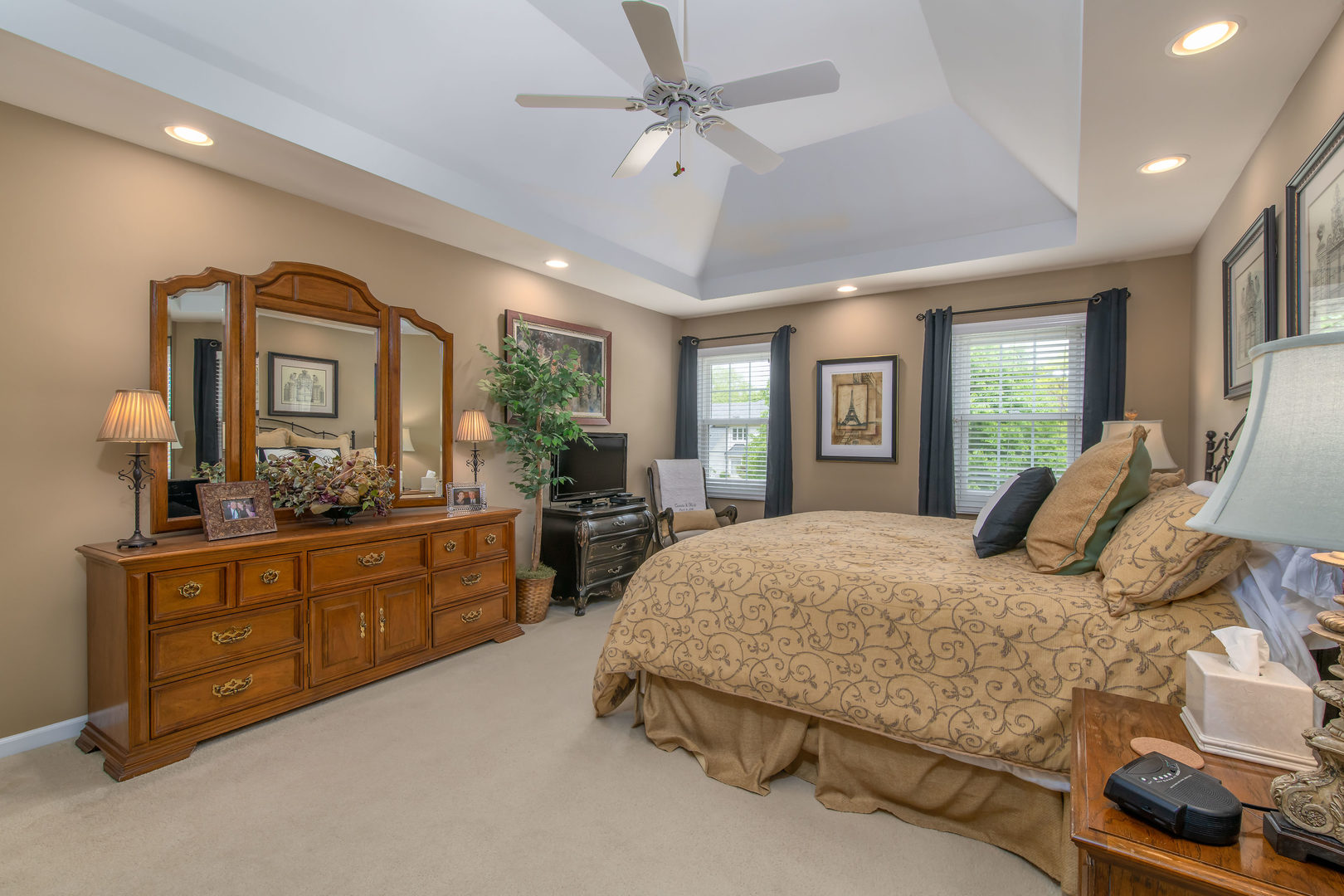 1608 Grommon Road Naperville, IL 60564 - Photo 23 of 48 a bedroom with a large bed and wooden floor