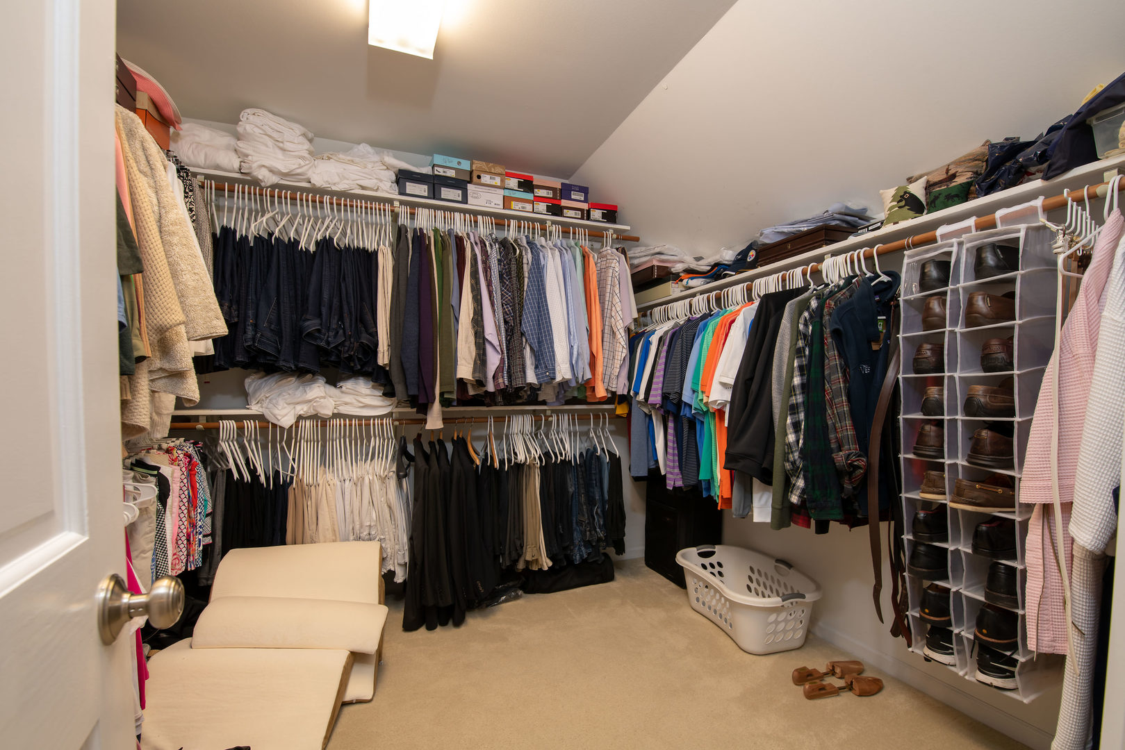 1608 Grommon Road Naperville, IL 60564 - Photo 26 of 48 a view of walk in closet with clothes and shoes