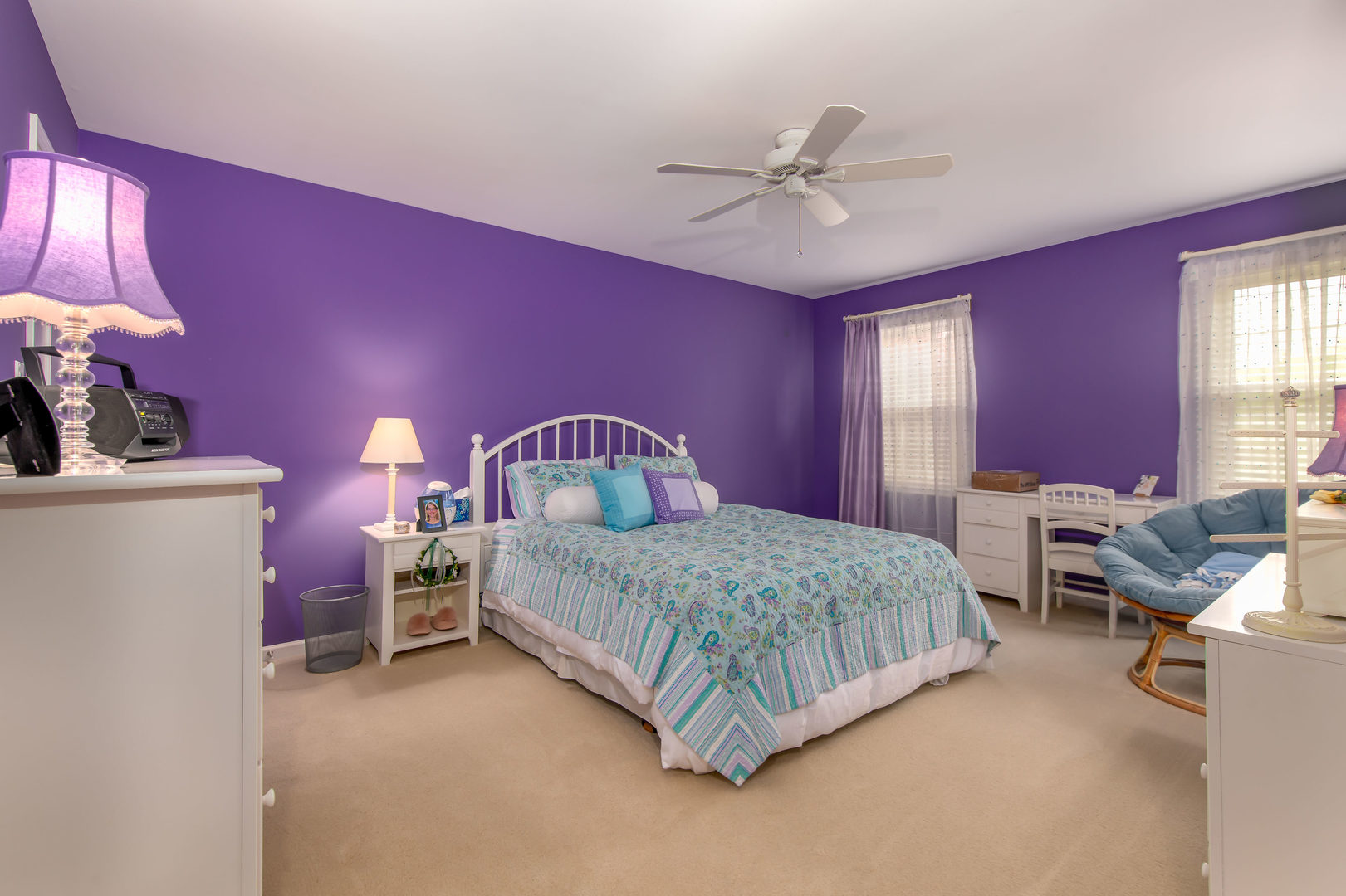 1608 Grommon Road Naperville, IL 60564 - Photo 28 of 48 a spacious bedroom with a bed and a chandelier