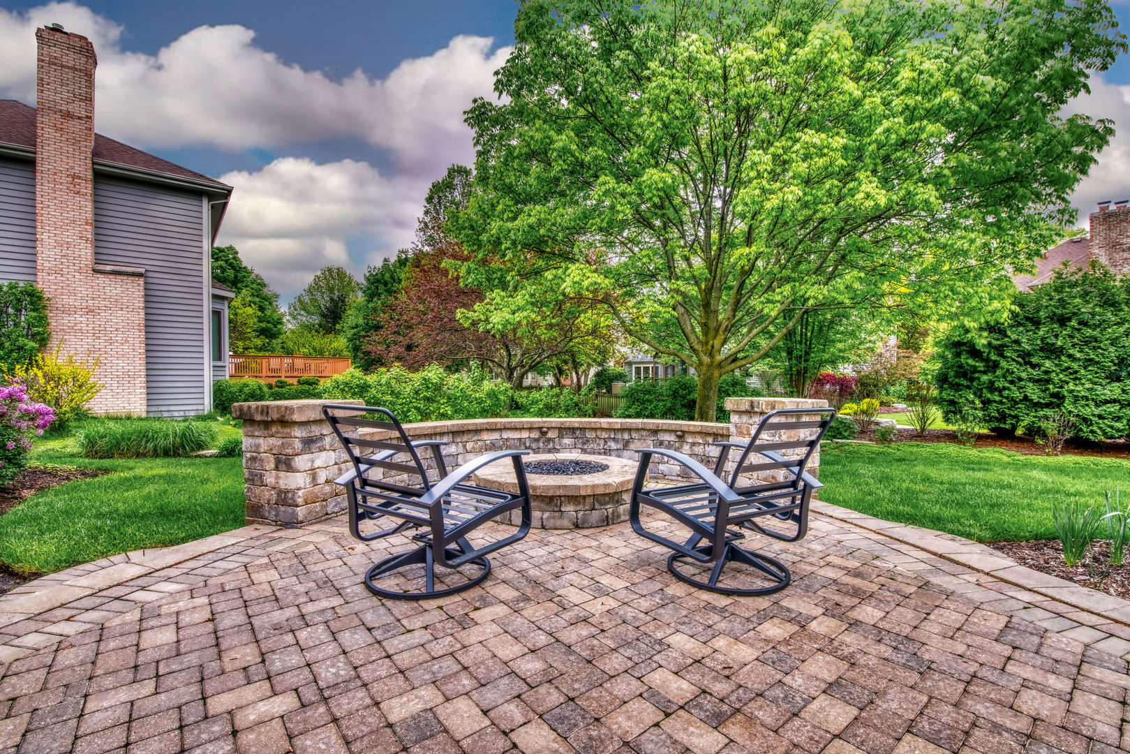 1608 Grommon Road Naperville, IL 60564 - Photo 38 of 48 a view of a patio with table and chairs and potted plants