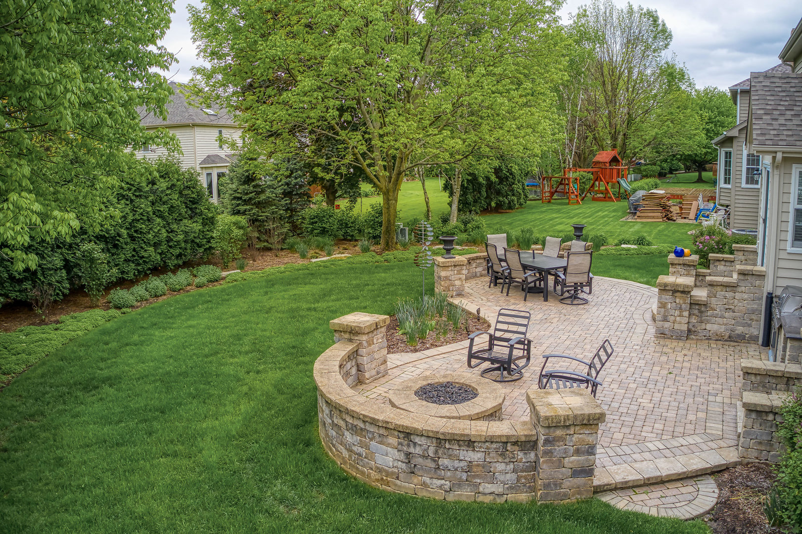 1608 Grommon Road Naperville, IL 60564 - Photo 40 of 48 a view of a backyard with sitting area and garden