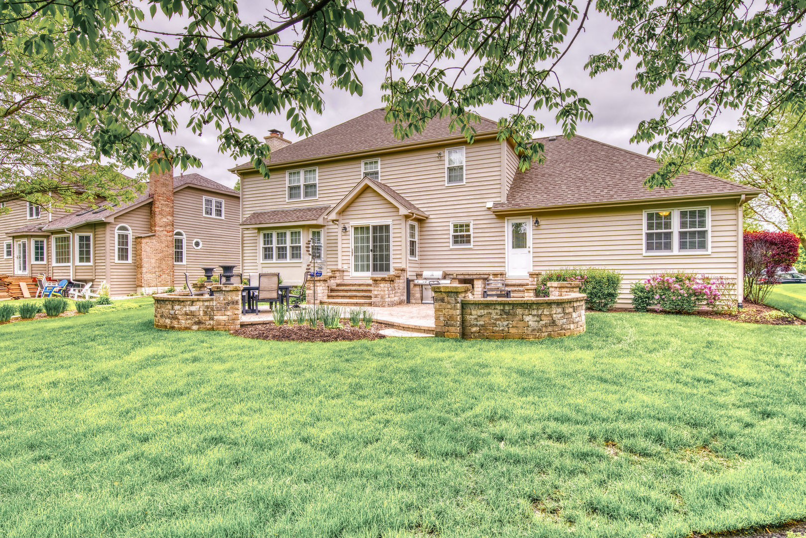 1608 Grommon Road Naperville, IL 60564 - Photo 41 of 48 a view of a house with a yard porch and sitting area