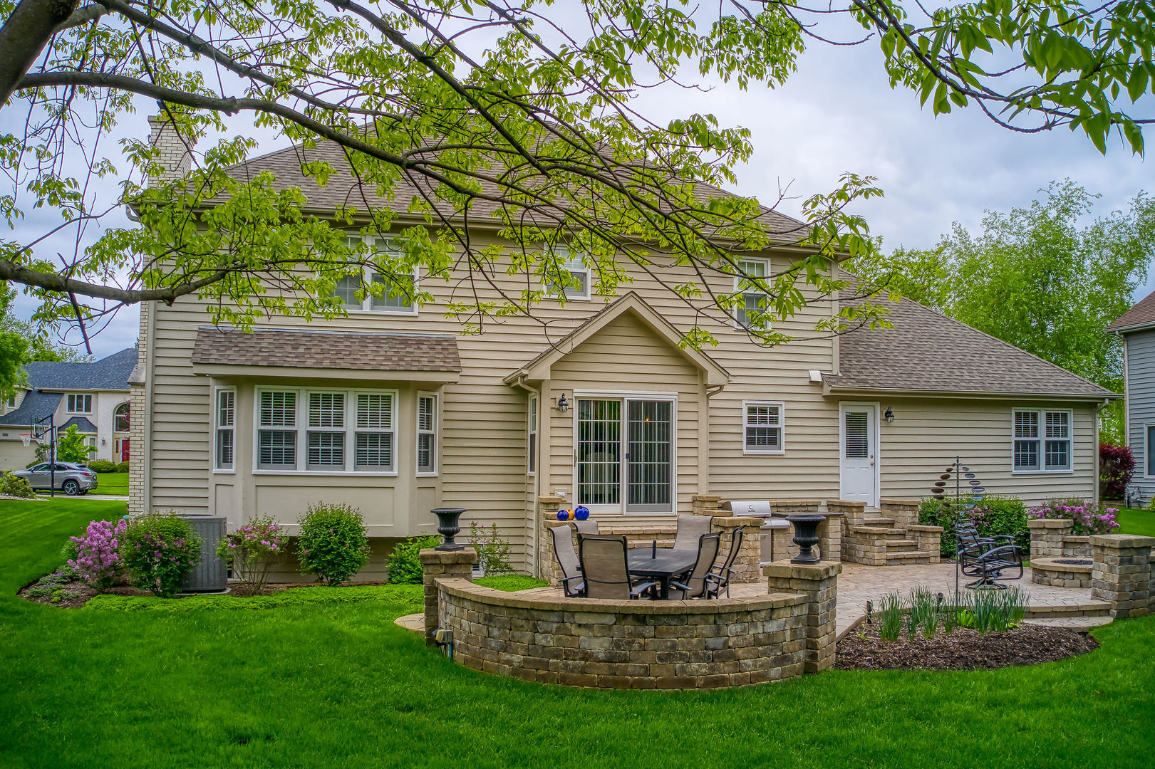1608 Grommon Road Naperville, IL 60564 - Photo 43 of 48 a front view of house with a garden and patio