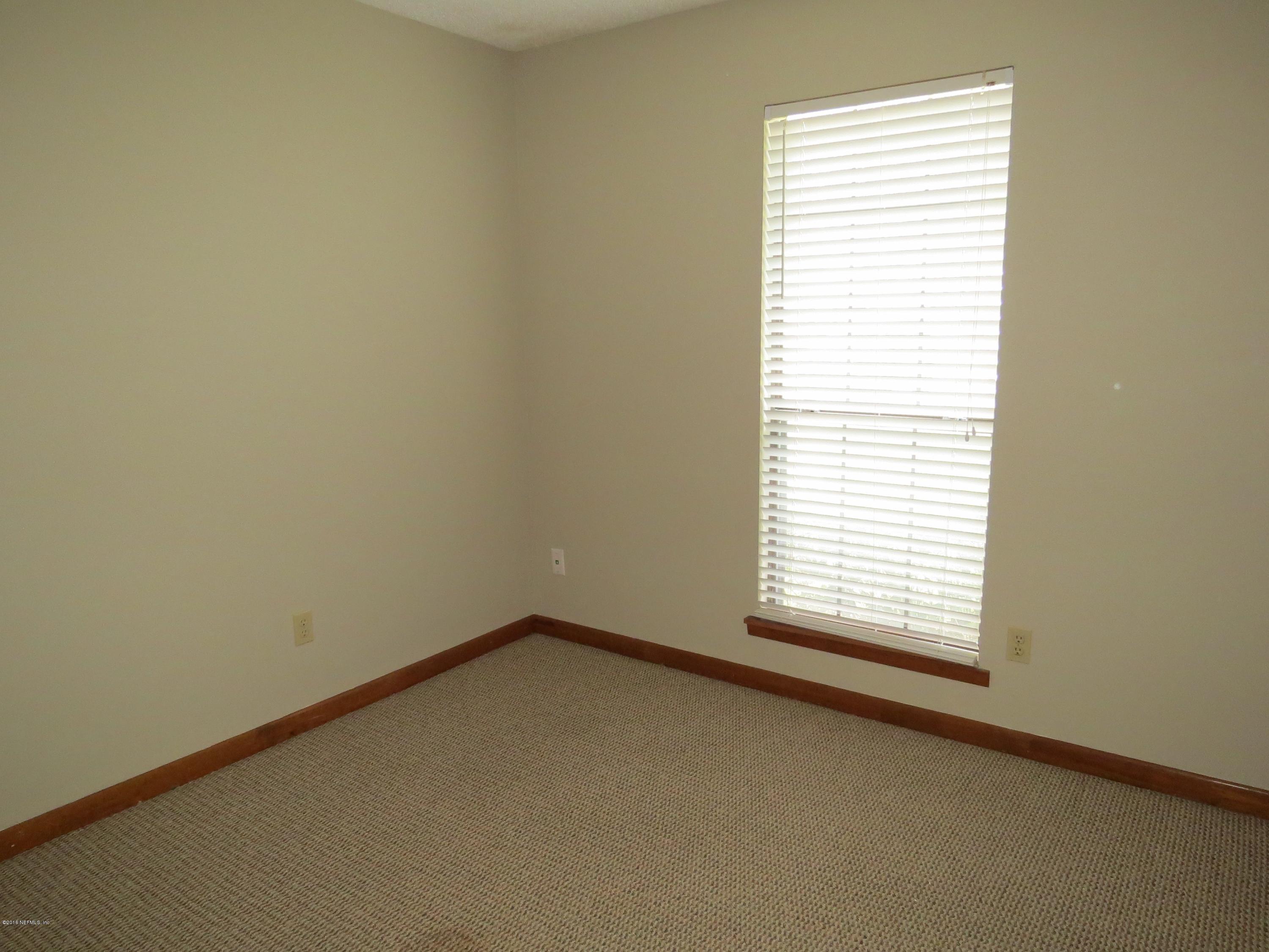 12770 Beaubien Road Jacksonville, FL 32258 - Photo 22 of 46 an empty room with a window