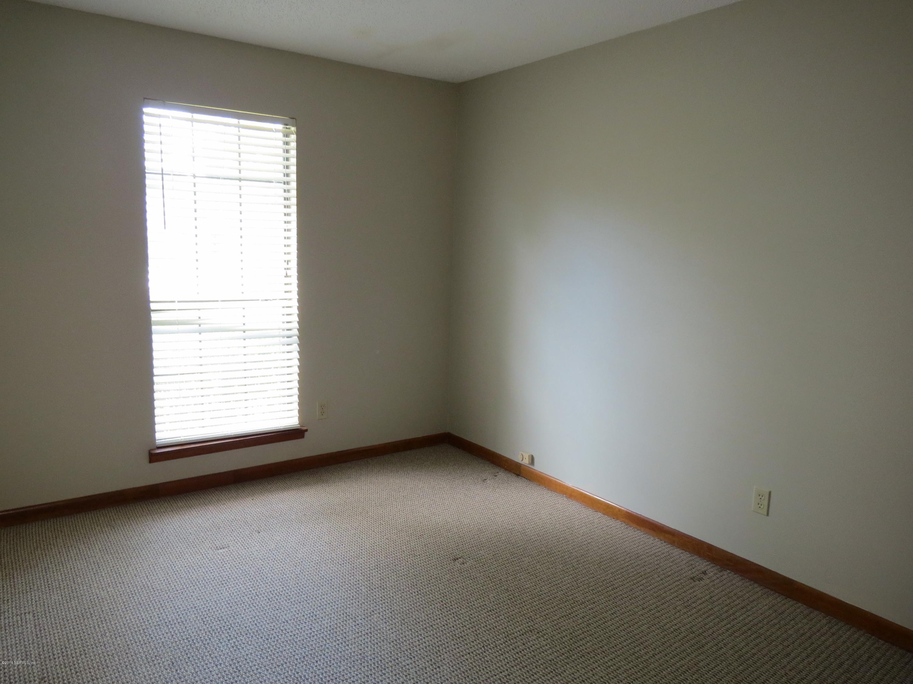 12770 Beaubien Road Jacksonville, FL 32258 - Photo 24 of 46 an empty room with a window