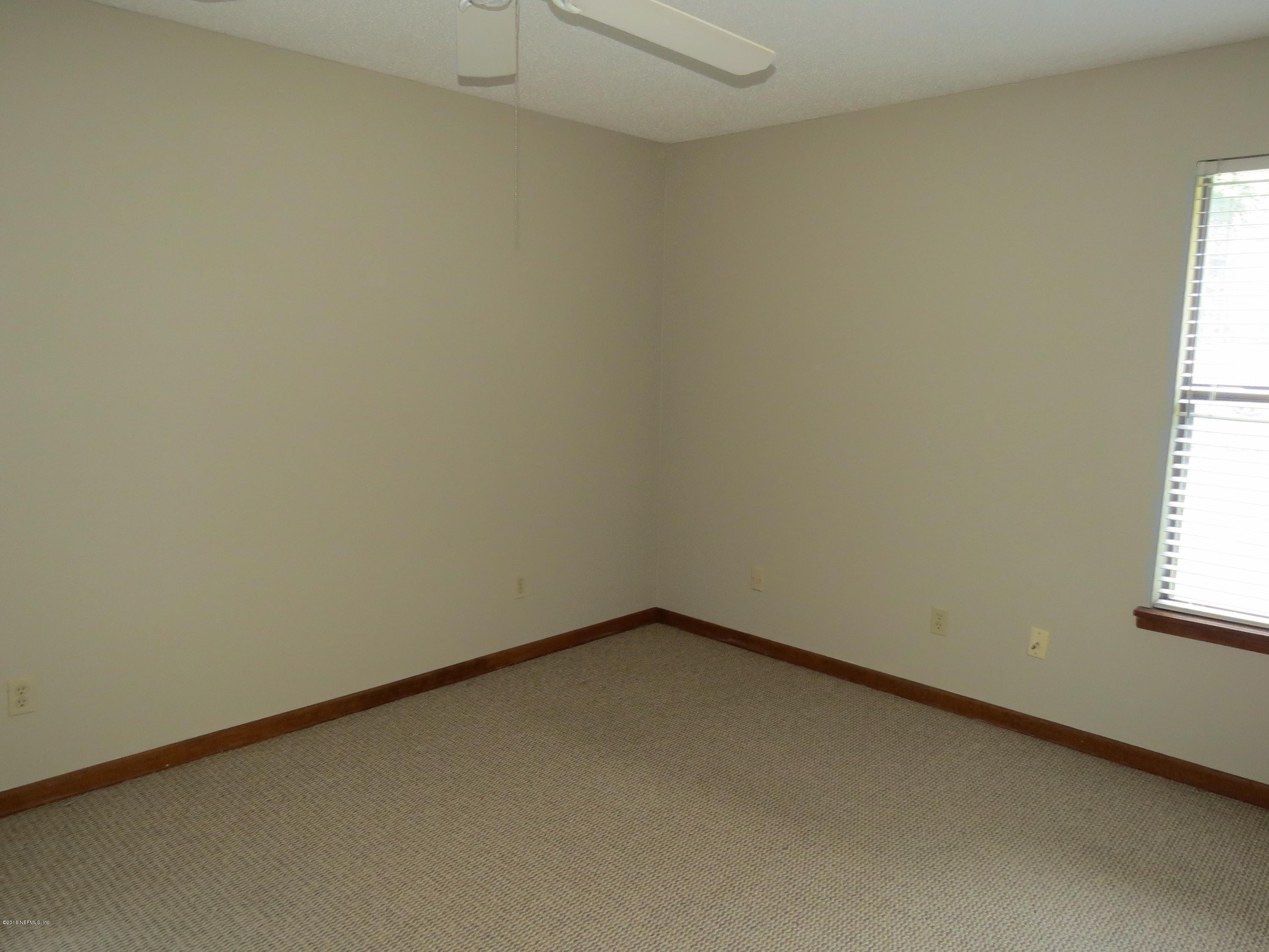 12770 Beaubien Road Jacksonville, FL 32258 - Photo 27 of 46 an empty room with a window