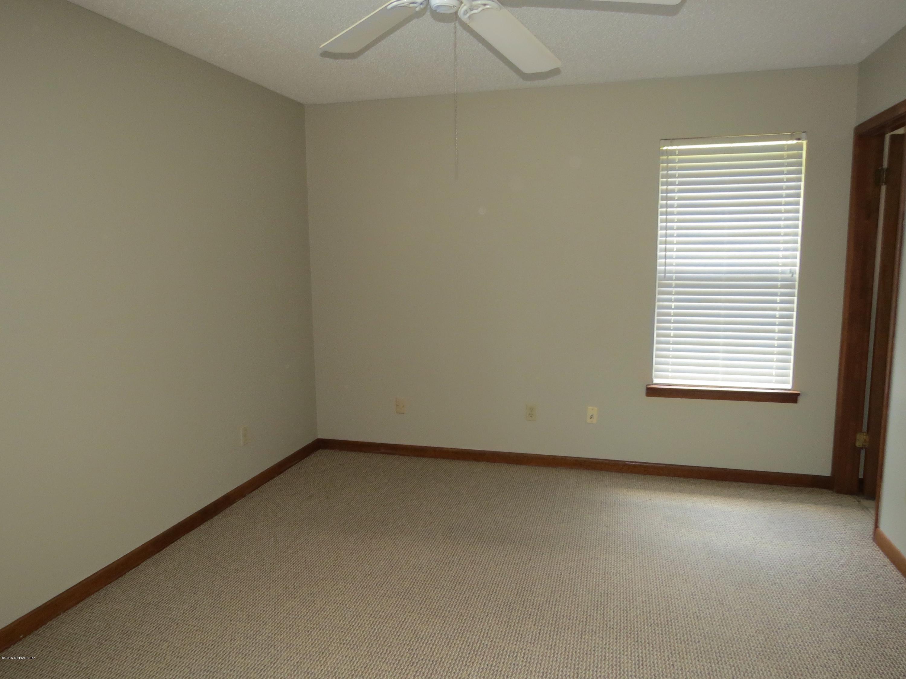 12770 Beaubien Road Jacksonville, FL 32258 - Photo 28 of 46 an empty room with a window