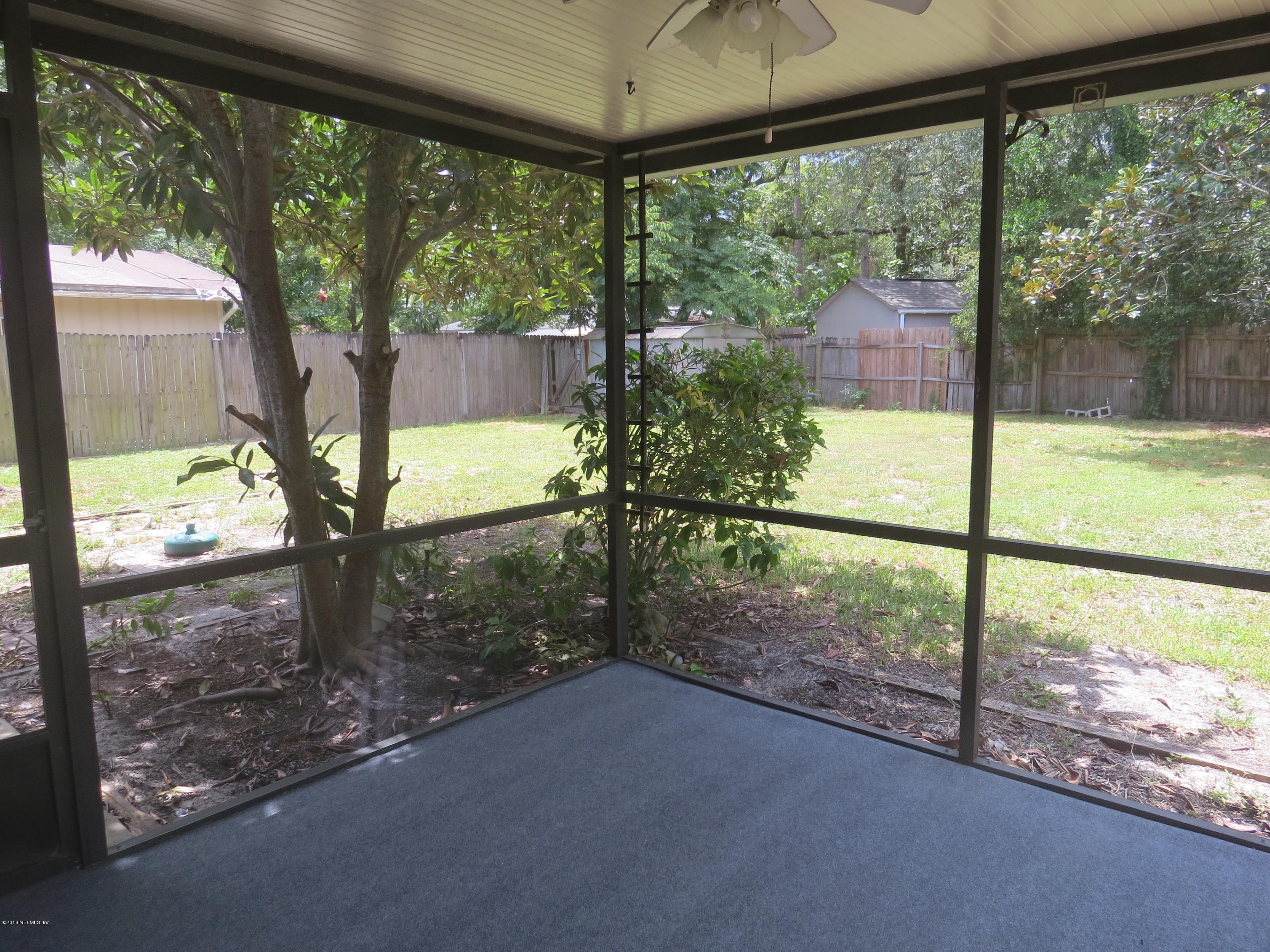 12770 Beaubien Road Jacksonville, FL 32258 - Photo 35 of 46 a view of a yard with porch