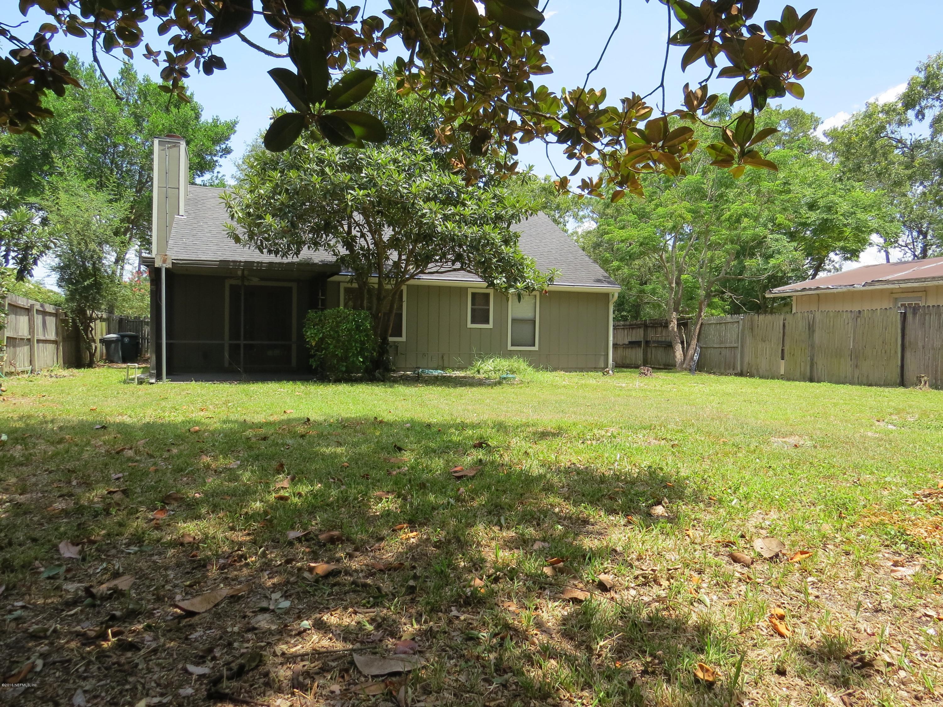 12770 Beaubien Road Jacksonville, FL 32258 - Photo 38 of 46 a house view with a garden space