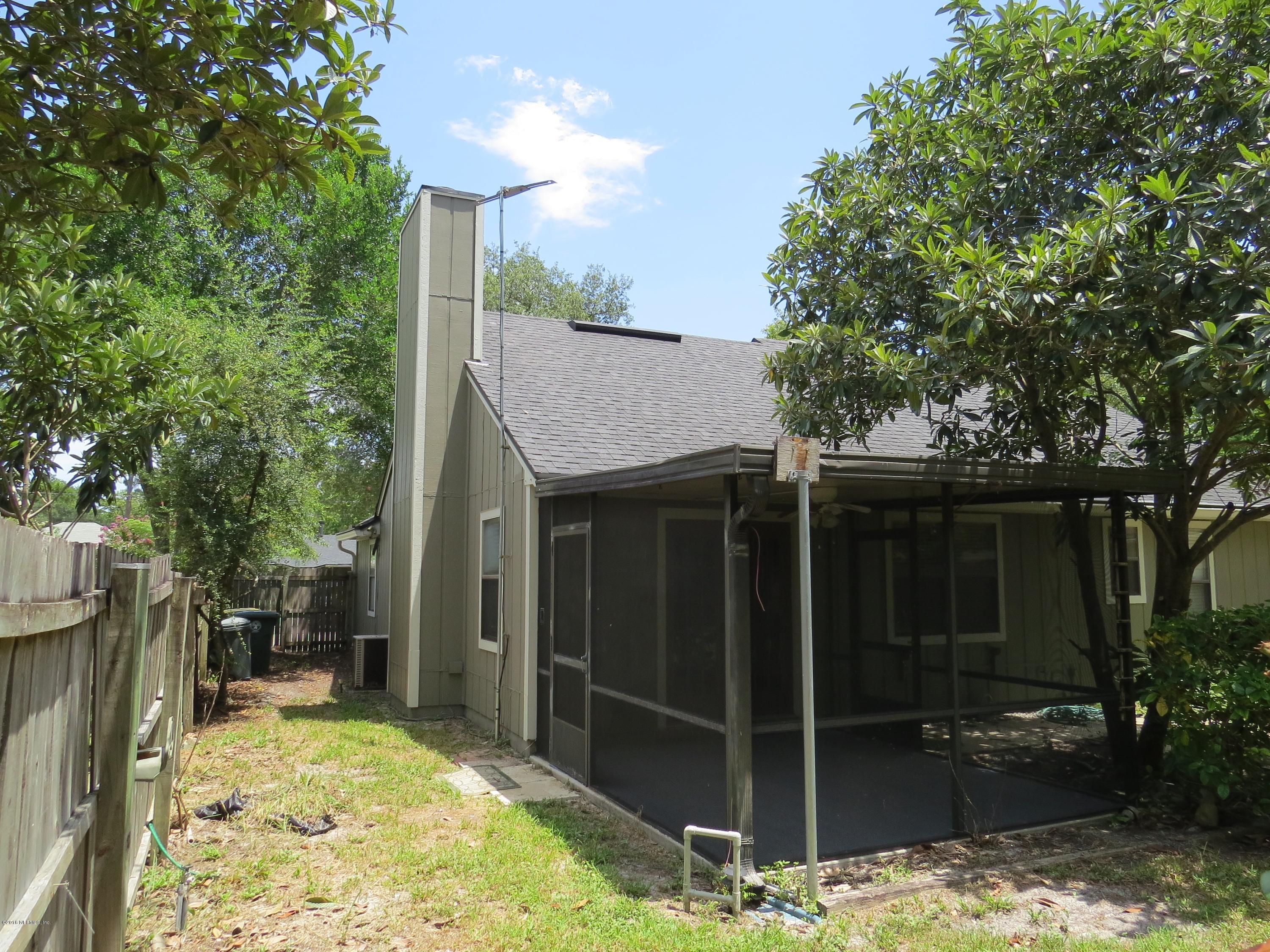 12770 Beaubien Road Jacksonville, FL 32258 - Photo 39 of 46 a view of backyard with tub