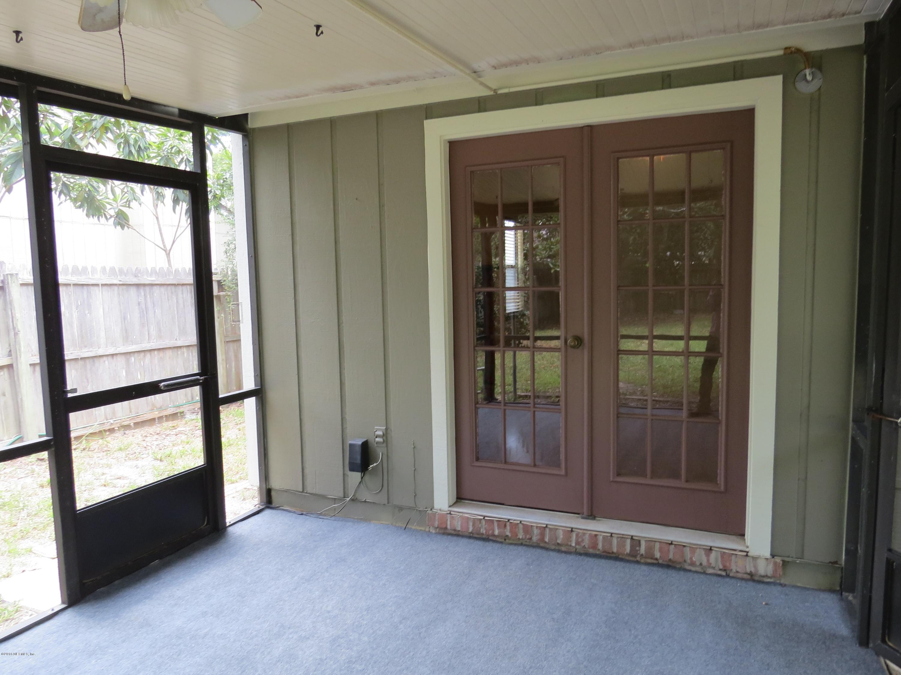 12770 Beaubien Road Jacksonville, FL 32258 - Photo 40 of 46 a view of entryway with window and chandelier