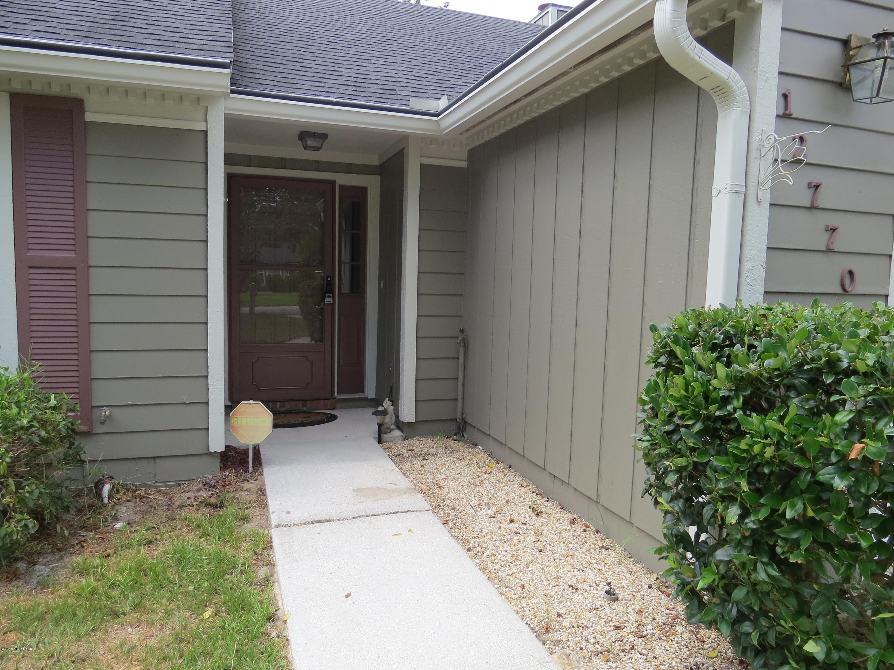 12770 Beaubien Road Jacksonville, FL 32258 - Photo 4 of 46 a front view of a house with a yard