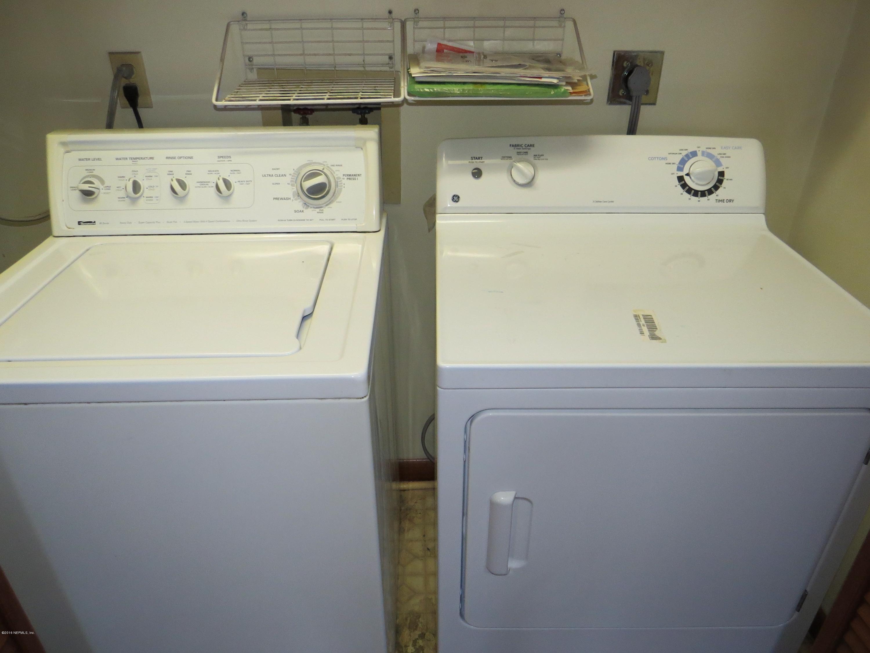 12770 Beaubien Road Jacksonville, FL 32258 - Photo 42 of 46 a utility room with dryer and washer