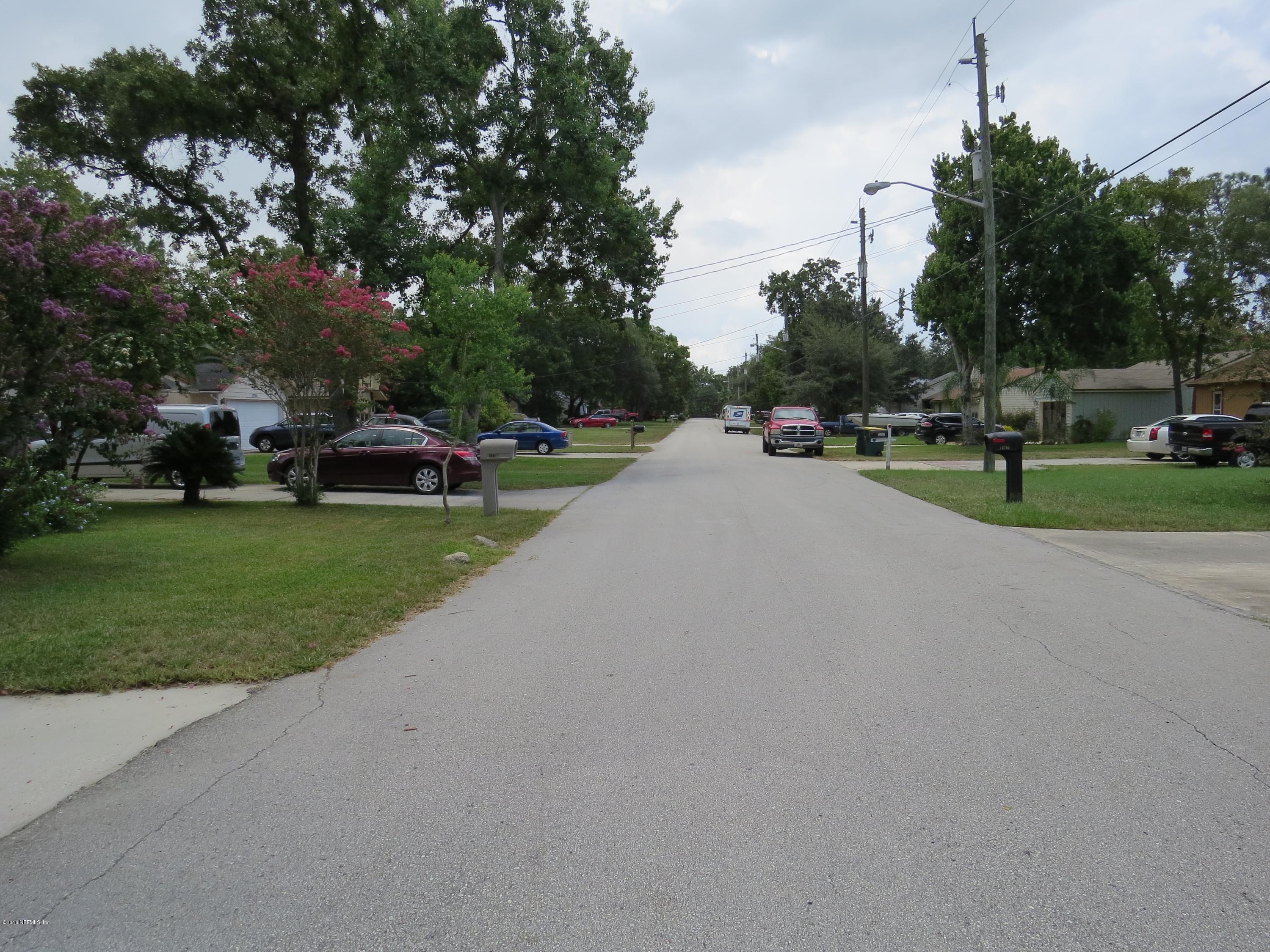 12770 Beaubien Road Jacksonville, FL 32258 - Photo 45 of 46 a view of a street with houses and trees