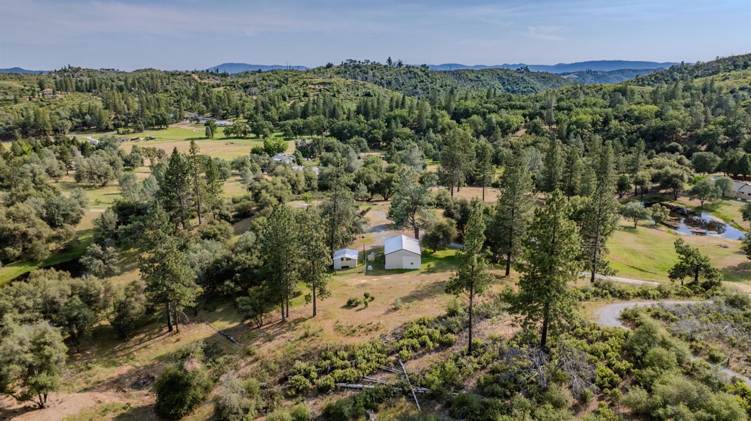 6216 Trout Lane Mountain Ranch, CA 95246 - Photo 39 of 39 a view of a town with mountains in the background