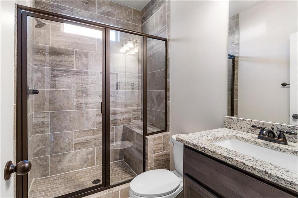191 Crystal Lake Boulevard Hampton, GA 30228 - Photo 26 of 68 a bathroom with a granite countertop sink toilet and shower
