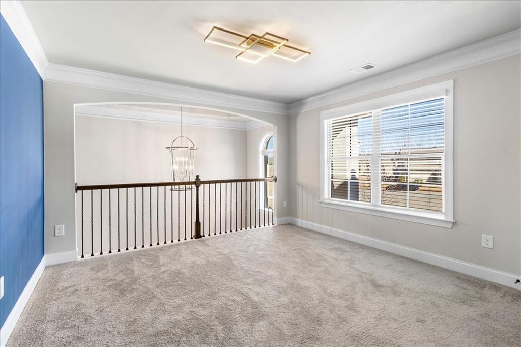 191 Crystal Lake Boulevard Hampton, GA 30228 - Photo 27 of 68 a view of an empty room with a window