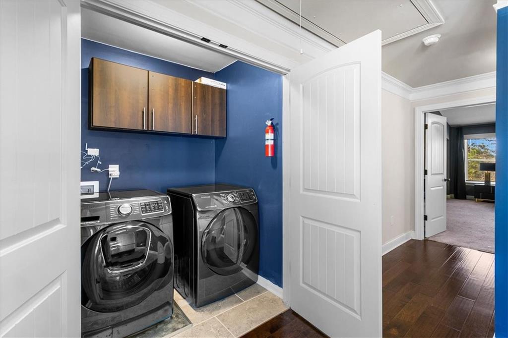 191 Crystal Lake Boulevard Hampton, GA 30228 - Photo 45 of 68 a utility room with sink dryer and washer