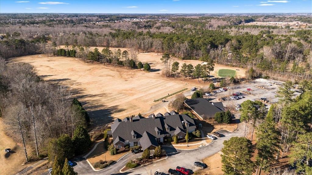 191 Crystal Lake Boulevard Hampton, GA 30228 - Photo 65 of 68 an aerial view of a house with a yard
