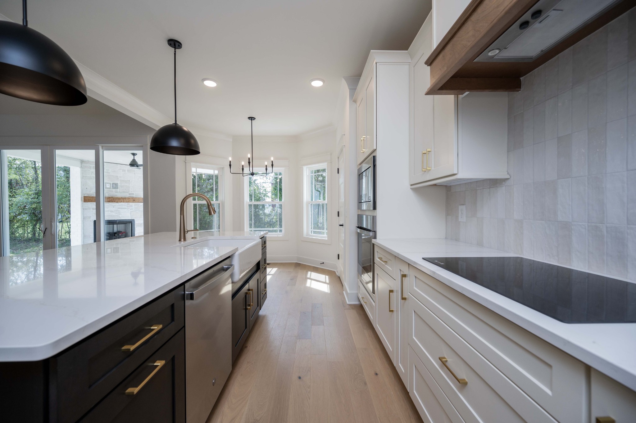4 Holly Grove Road Lascassas, TN 37085 - Photo 11 of 37 a kitchen with stainless steel appliances granite countertop a sink a counter space and cabinets
