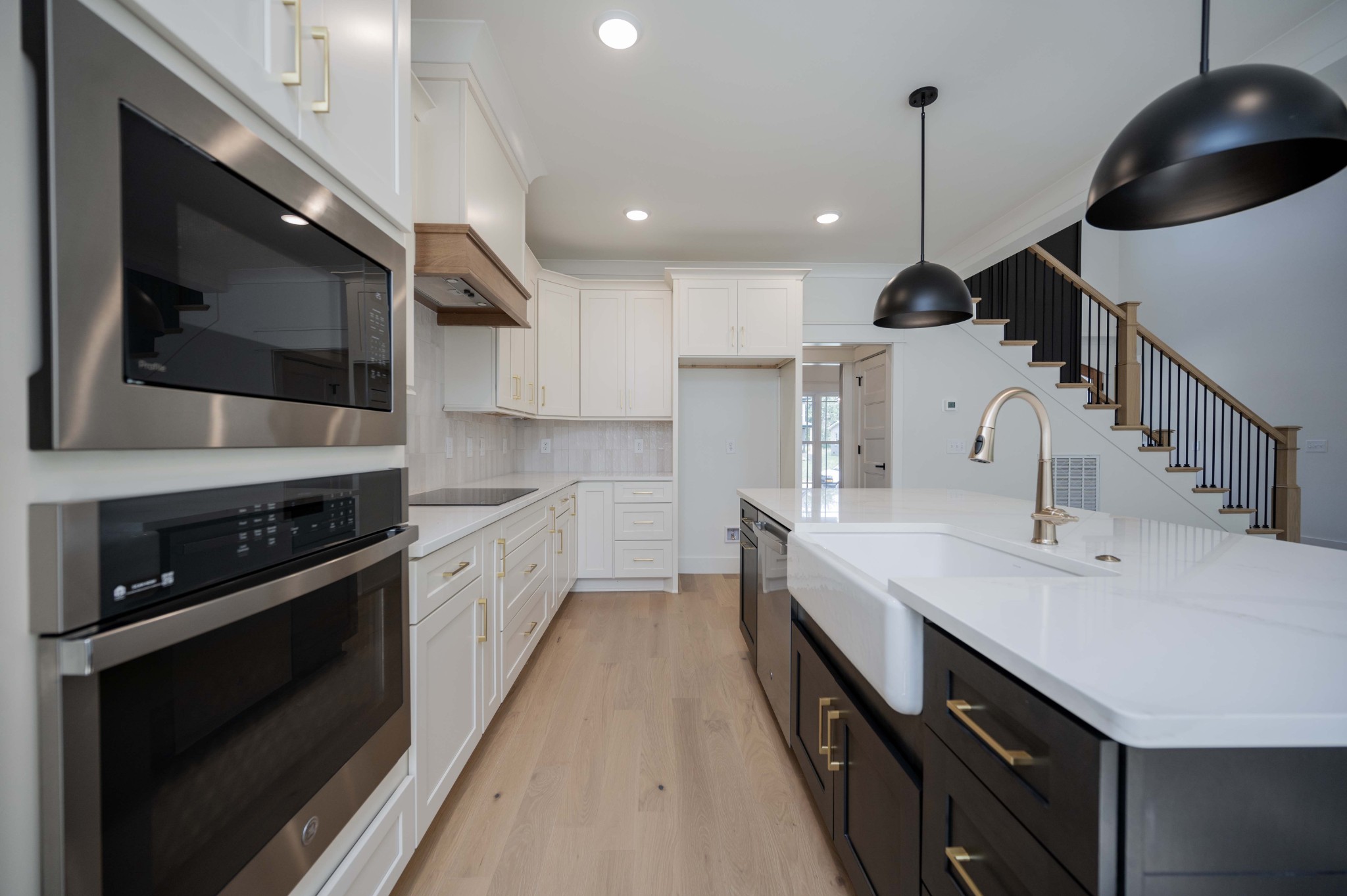4 Holly Grove Road Lascassas, TN 37085 - Photo 12 of 37 a kitchen with stainless steel appliances kitchen island a sink stove and cabinets