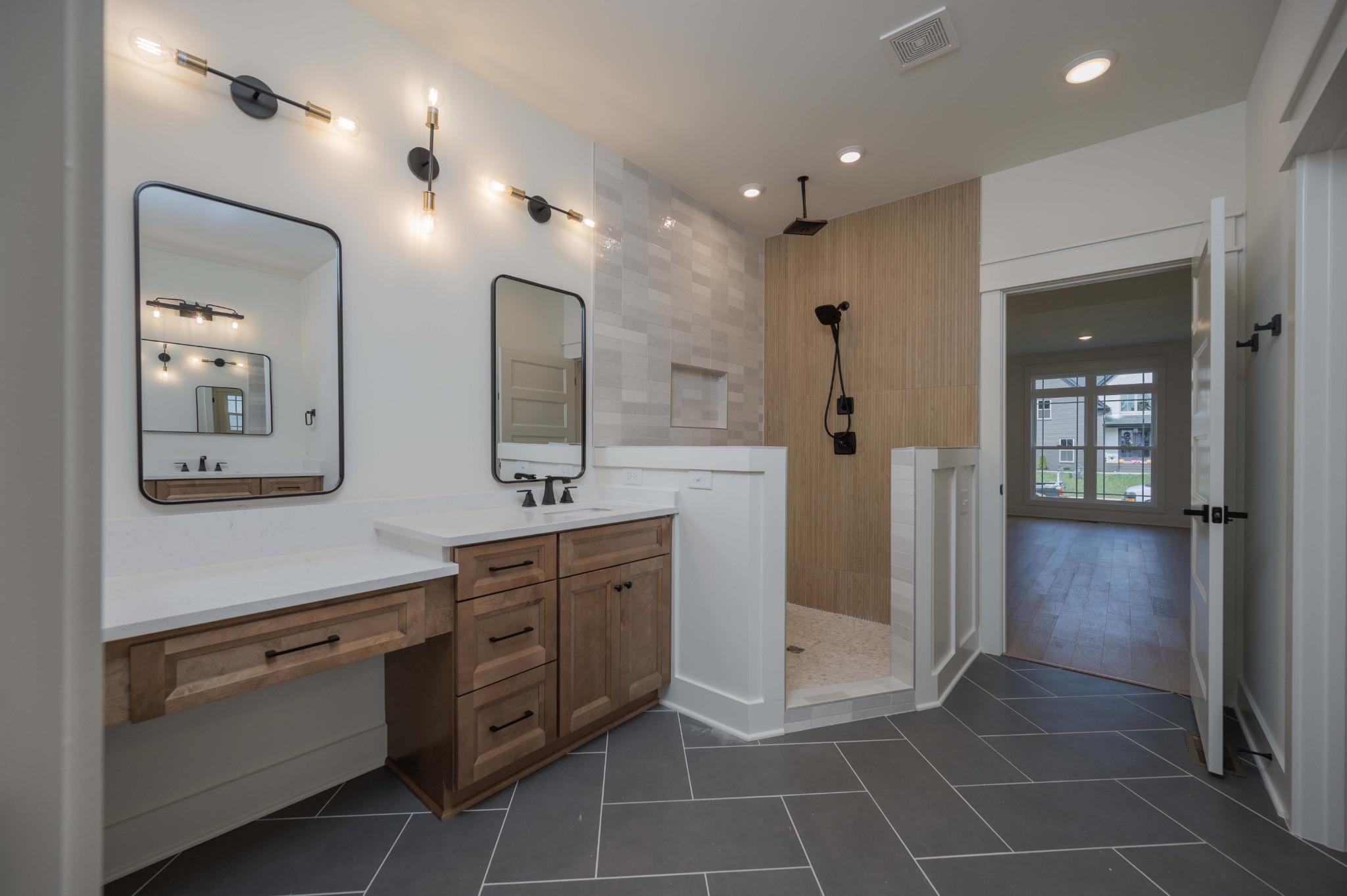 4 Holly Grove Road Lascassas, TN 37085 - Photo 25 of 37 a spacious bathroom with a shower a sink and a mirror