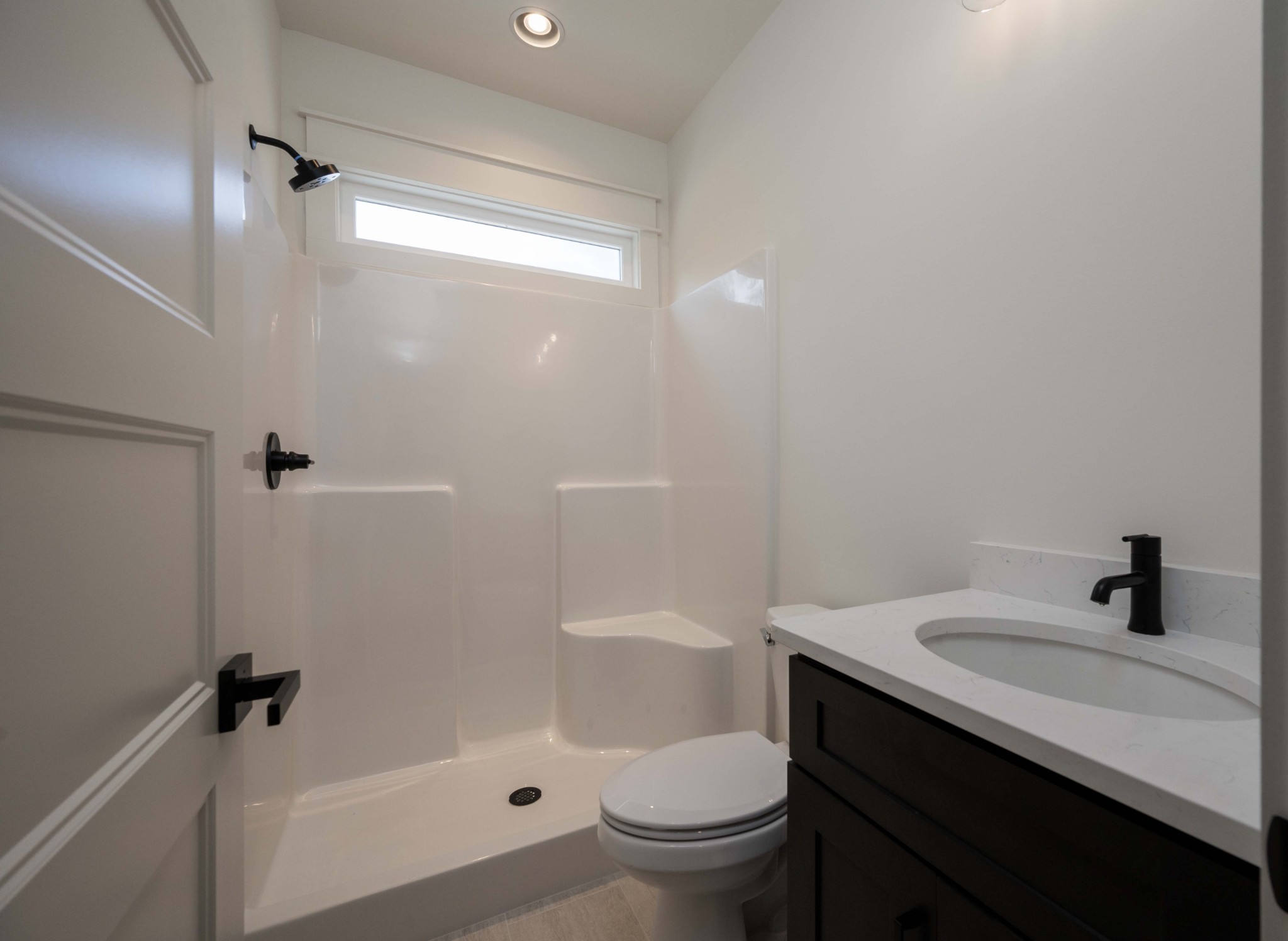 4 Holly Grove Road Lascassas, TN 37085 - Photo 33 of 37 a bathroom with a sink a toilet and shower