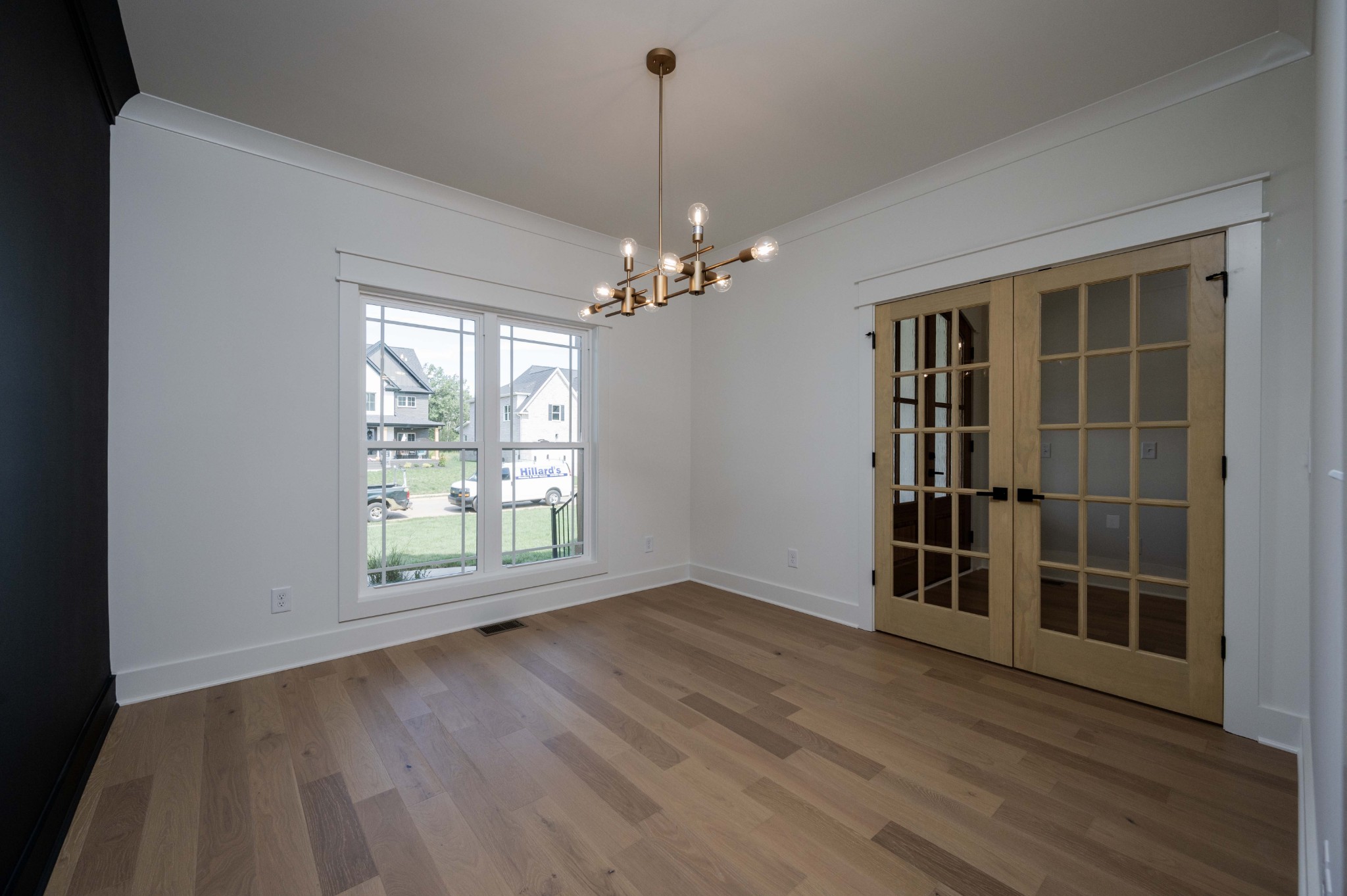 4 Holly Grove Road Lascassas, TN 37085 - Photo 4 of 37 an empty room with wooden floor and windows