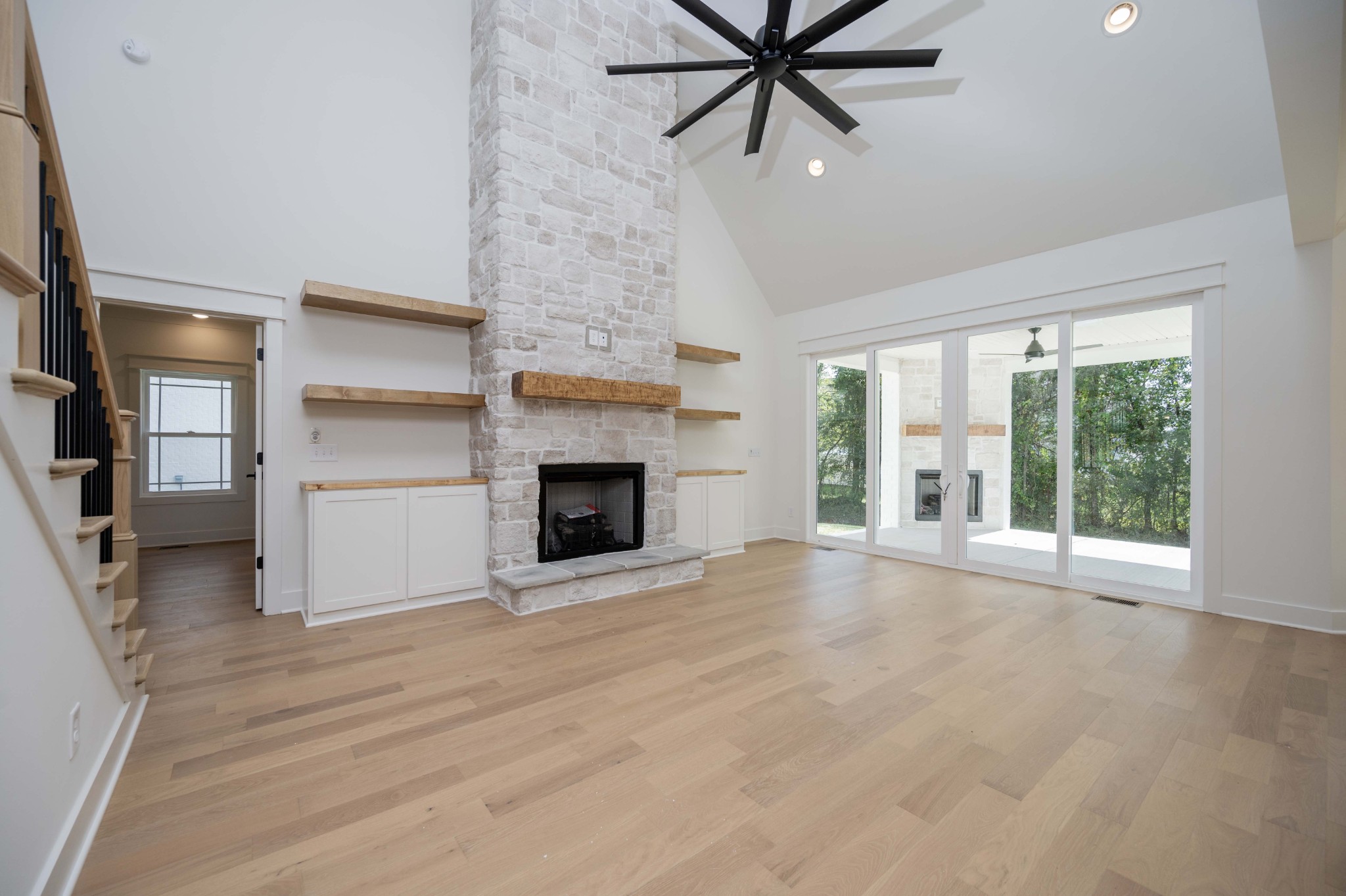 4 Holly Grove Road Lascassas, TN 37085 - Photo 5 of 37 a view of an empty room with a window and fireplace