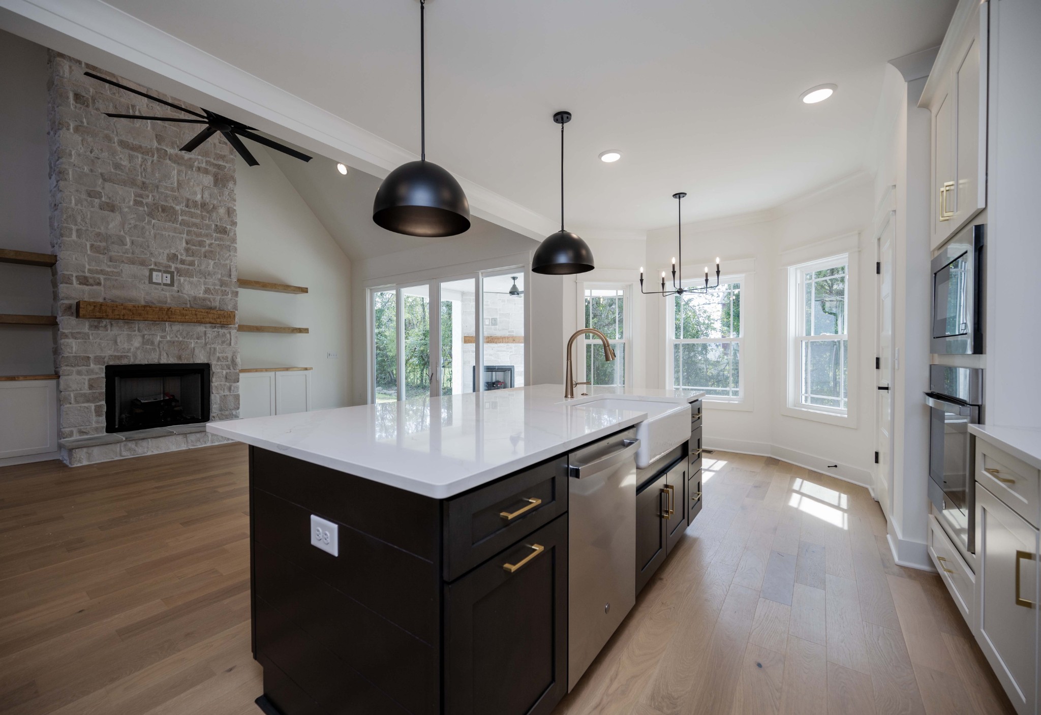 4 Holly Grove Road Lascassas, TN 37085 - Photo 10 of 37 a kitchen with stainless steel appliances granite countertop a sink a oven and a wooden floors