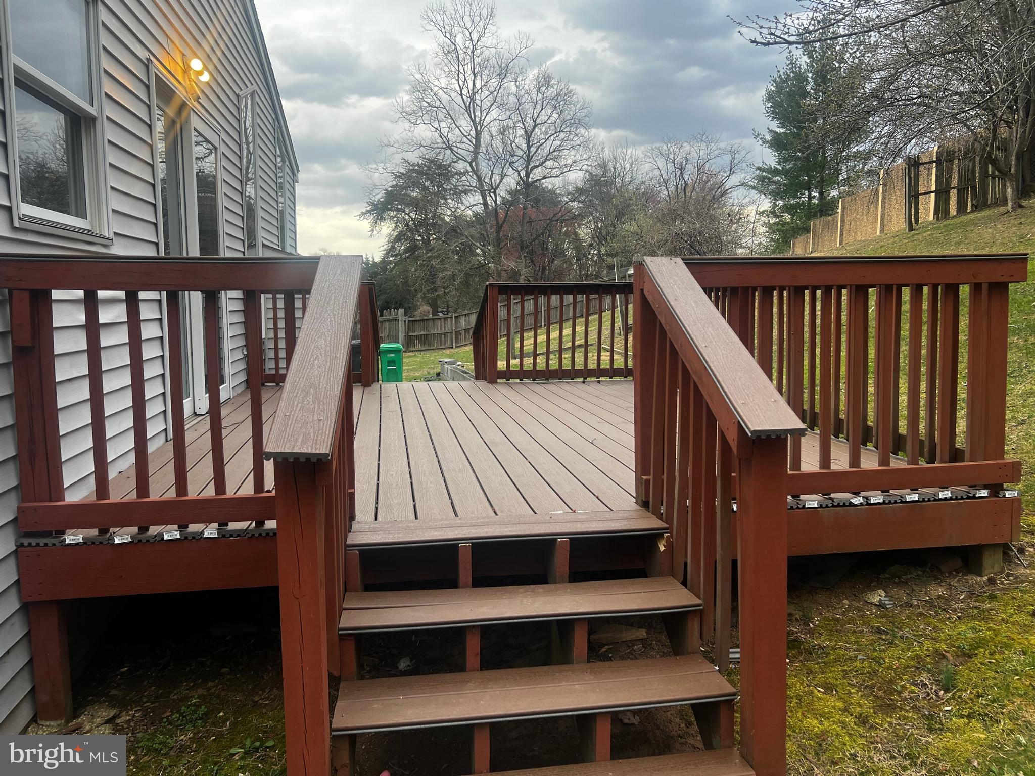 11009 Maiden Drive Bowie, MD 20720 - Photo 5 of 5 a view of a deck with wooden floor and fence