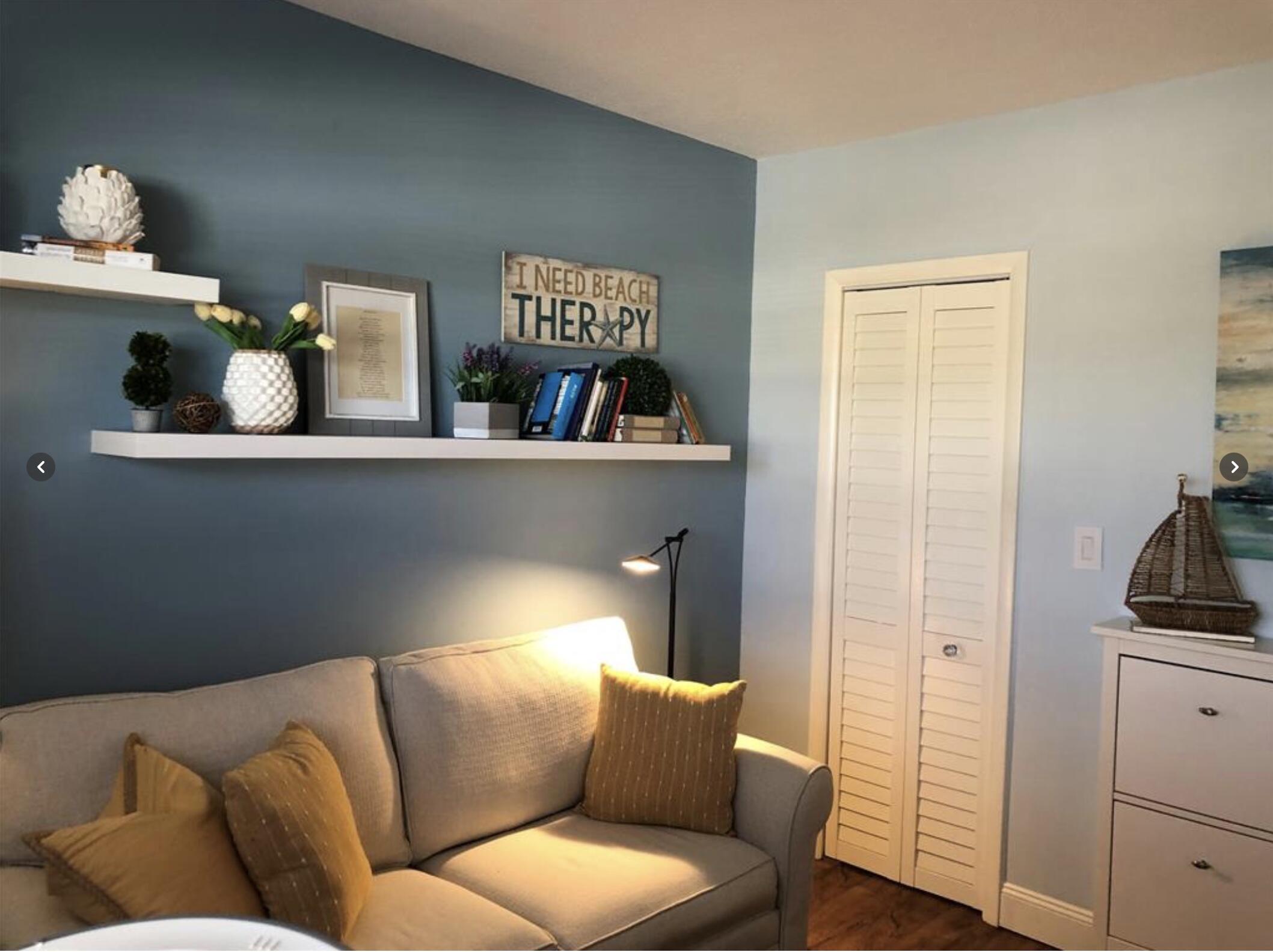 1951 Northeast 39th Street Northeast, Unit 249 Lighthouse Point, FL 33064 - Photo 13 of 23 a living room with furniture
