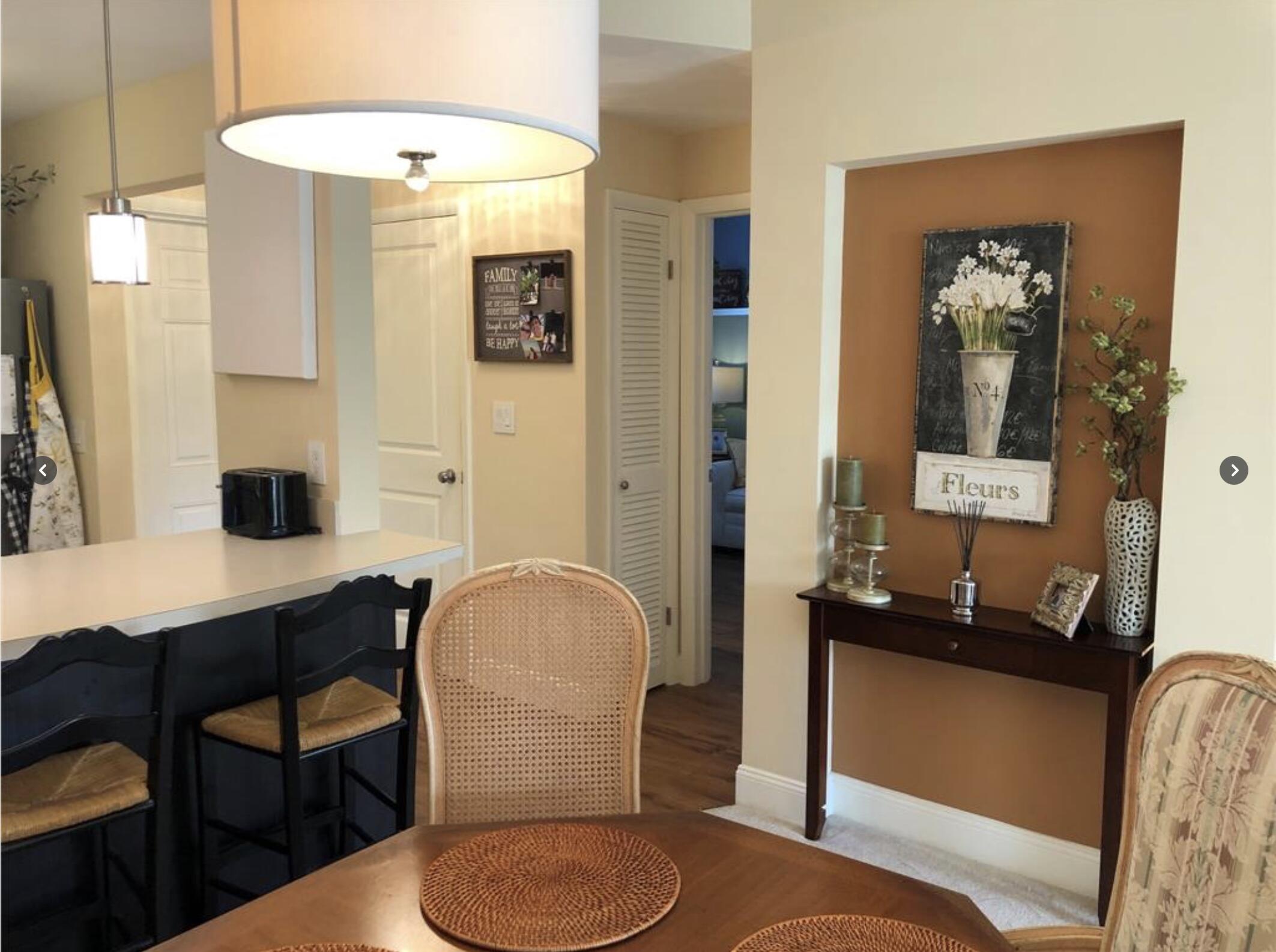 1951 Northeast 39th Street Northeast, Unit 249 Lighthouse Point, FL 33064 - Photo 18 of 23 a bathroom with a toilet a sink and a mirror