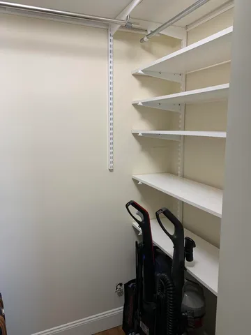 a view of a room with shelves