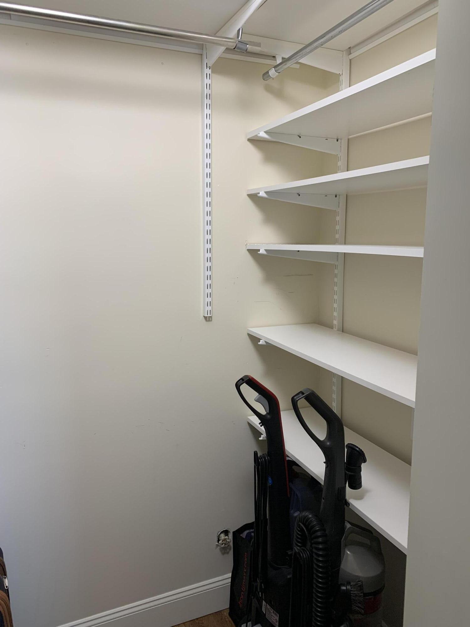 1951 Northeast 39th Street Northeast, Unit 249 Lighthouse Point, FL 33064 - Photo 20 of 23 a view of a room with shelves