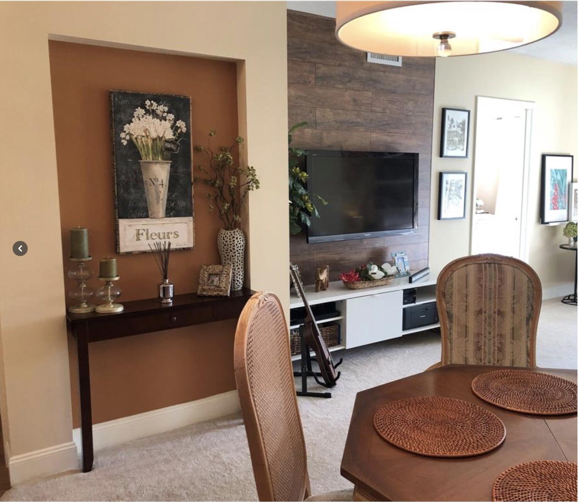 1951 Northeast 39th Street Northeast, Unit 249 Lighthouse Point, FL 33064 - Photo 5 of 23 a room with furniture and a fireplace