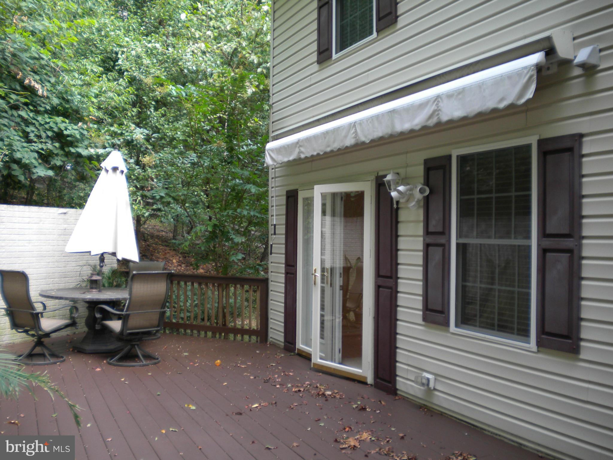 2813 Northwind Road Baltimore, MD 21234 - Photo 14 of 21 Spacious deck with awning