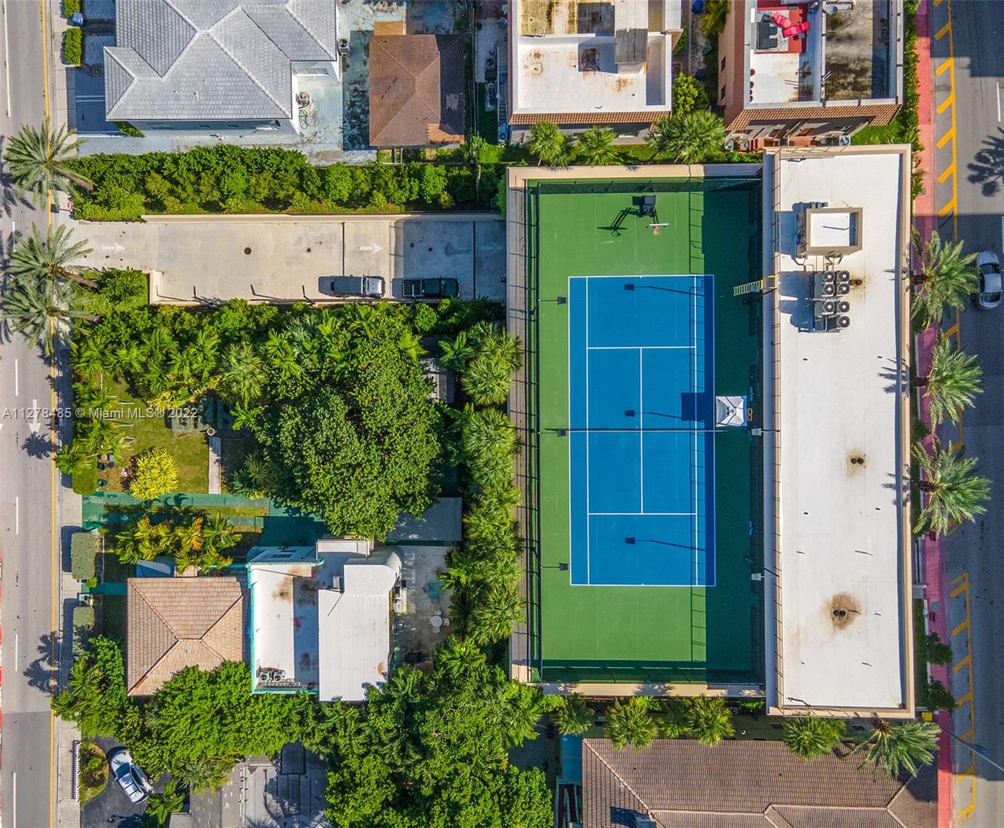 8927 Harding Avenue Surfside, FL 33154 - Photo 5 of 22 an aerial view of a house with a garden and plants